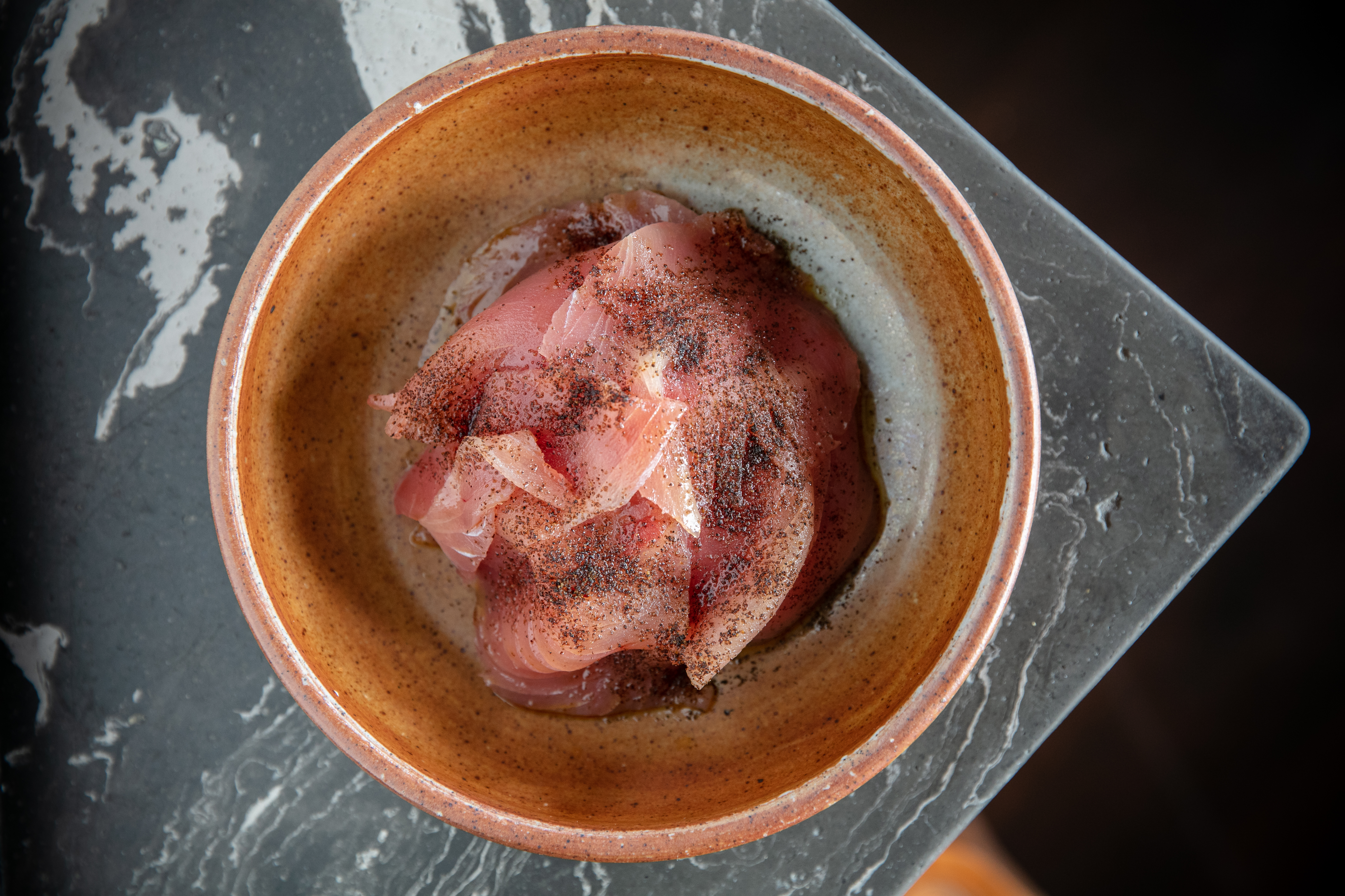 The tuna crudo with piquillo pepper and anchovy. Photo / Babiche Martens