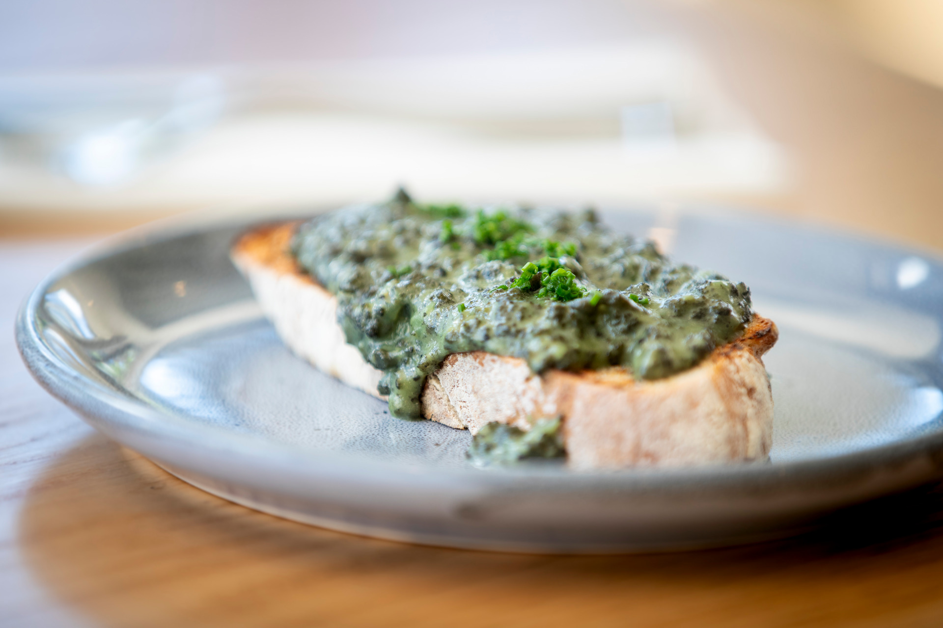 Creamed pāua on toast, from Homeland, Peter Gordon's new restaurant and cooking school. Photo/Michael Craig