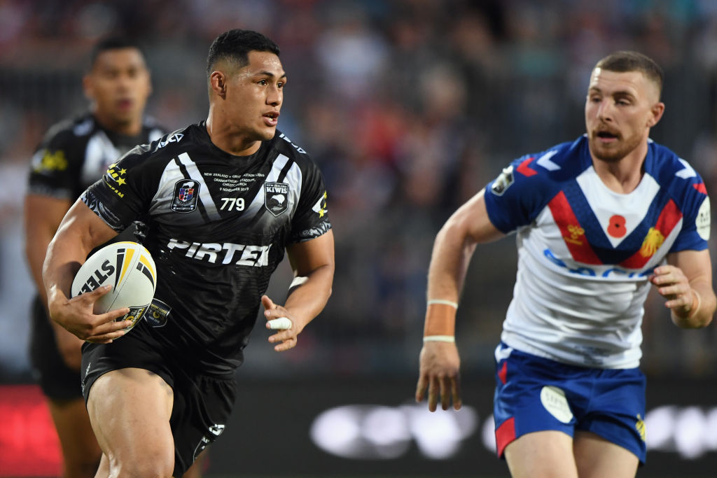Roger Tuivasa-Sheck of the Kiwis charges forward in a 2019 test against Great Britain. Photo / Getty Images