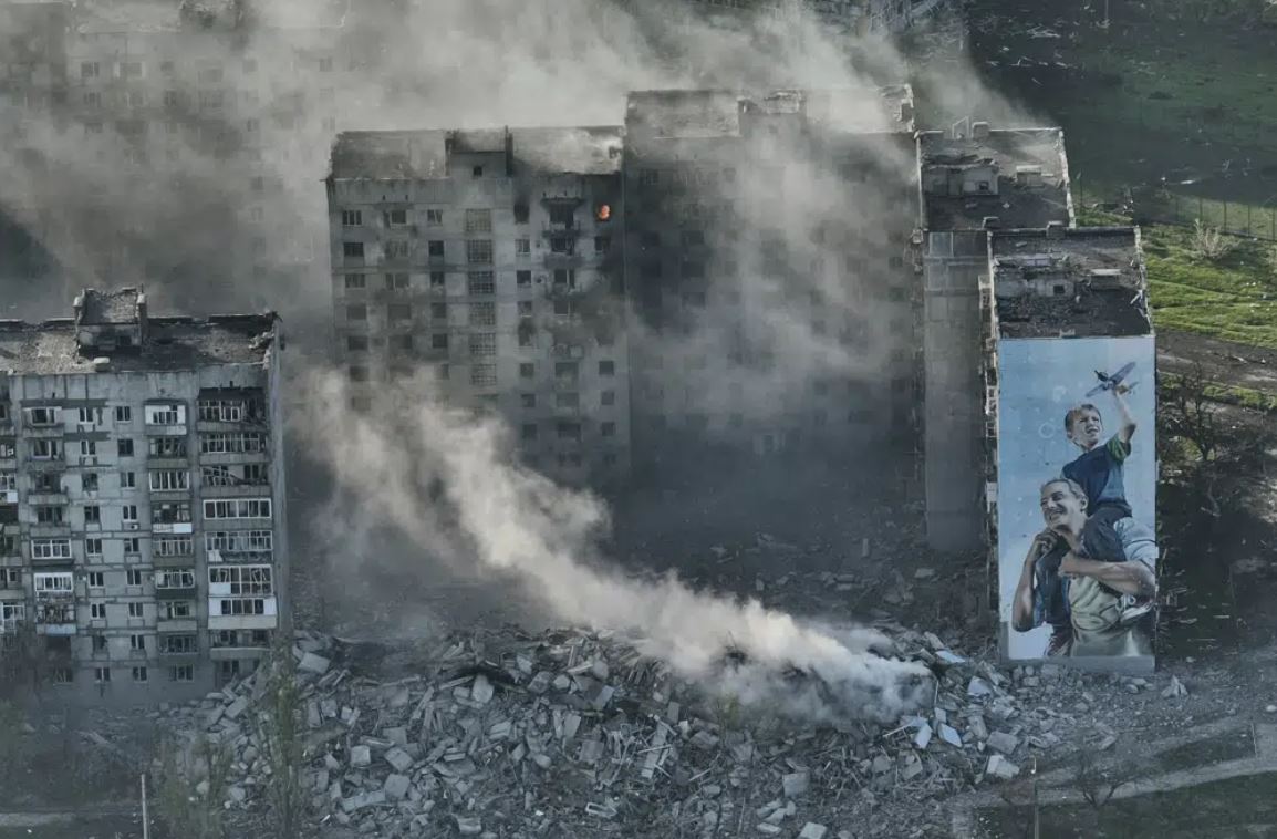 Smoke rises from a building in Bakhmut, the site of the heaviest battles with the Russian troops in the Donetsk region, Ukraine. Photo / AP