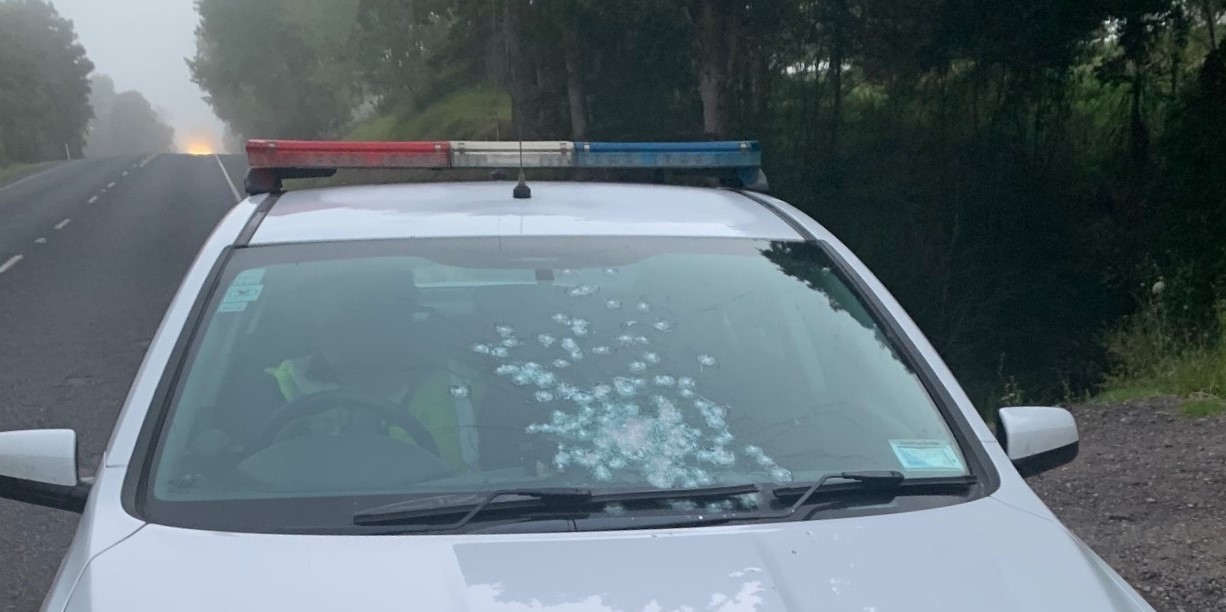 This police car was left with a damaged windscreen after a shotgun was discharged at officers at Puketona in October, last year. 