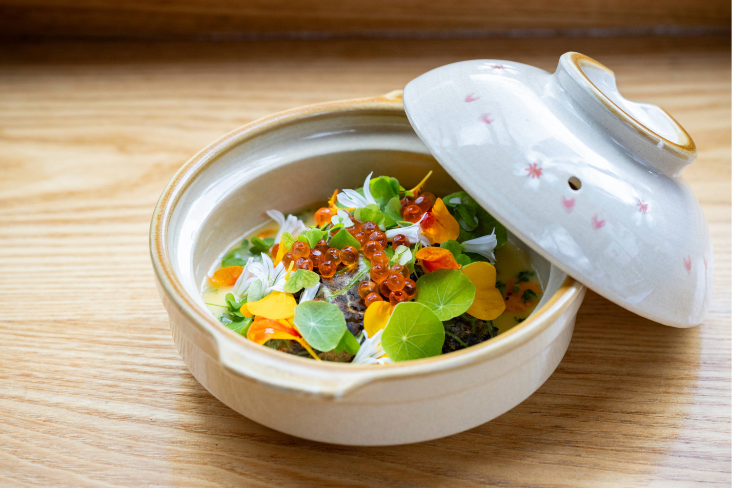 The salmon, yuzu butter and wood sorrel dish at Rhu in Parnell is both inventive and delicious. Photo / Babiche Martens