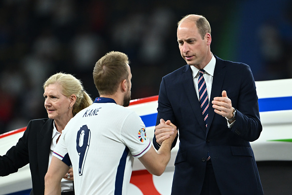 Harry Kane, of England, shakes hands with Prince William, Prince of Wales and President of The FA, as he collects his Runners Up Medal after the UEFA Euro 2024 final match between Spain and England at Olympiastadion in Berlin, Germany. Photo / Getty Images