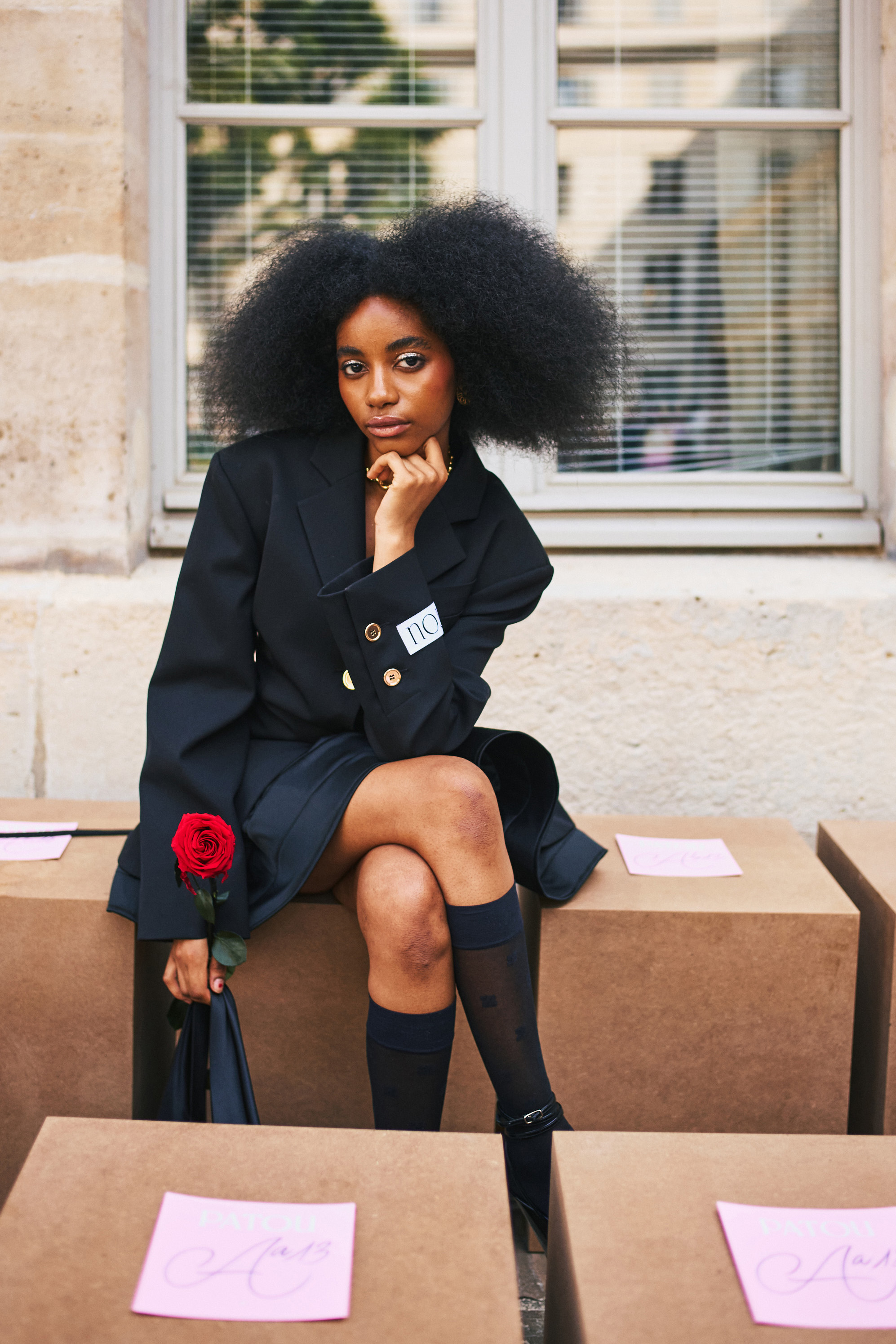 High, sheer socks and a jacket softly draping. Photo / New York Times