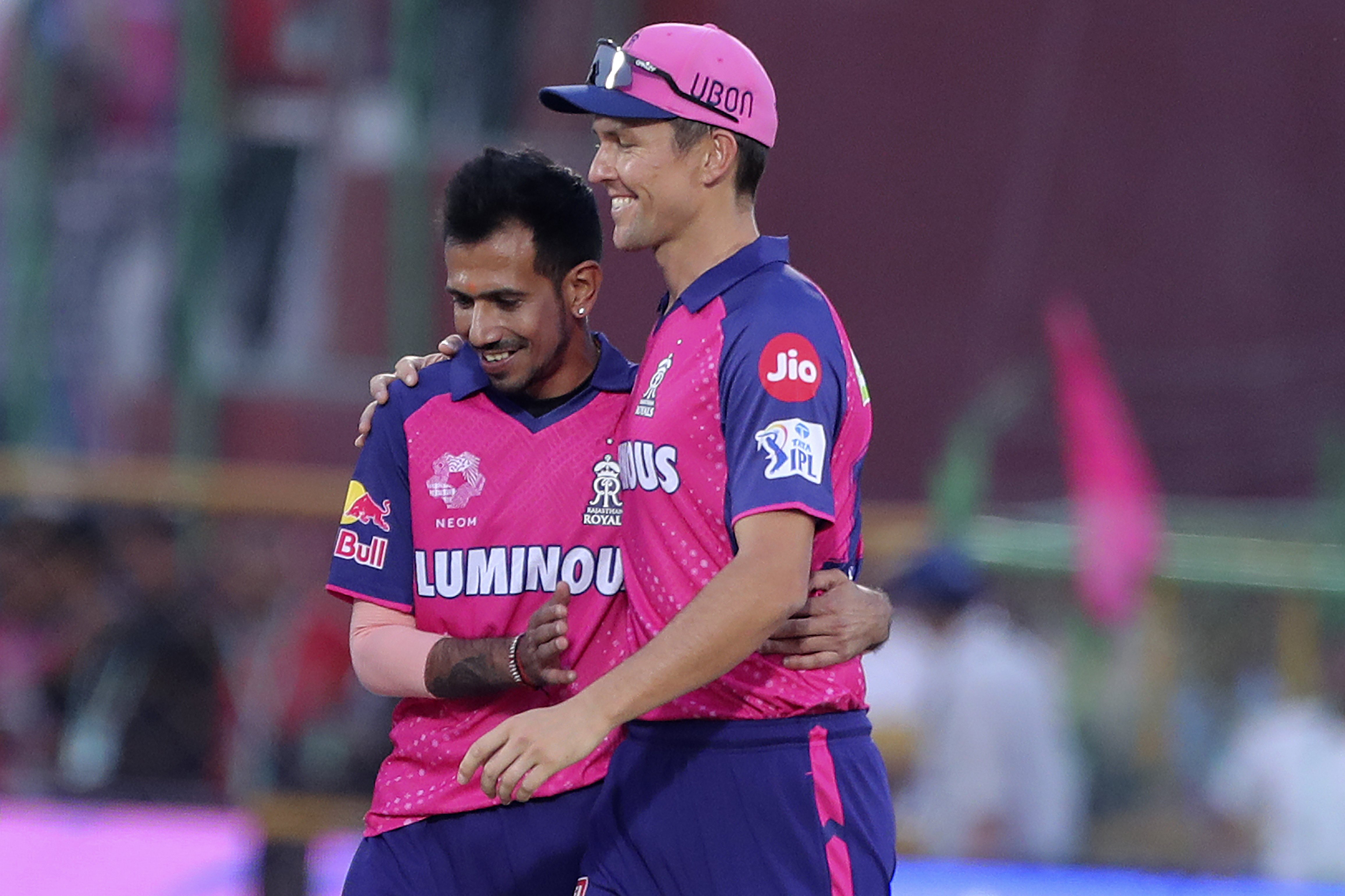 Rajasthan Royals' Yuzvendra Chahal, left, celebrates with teammate Trent Boult. Photo / AP