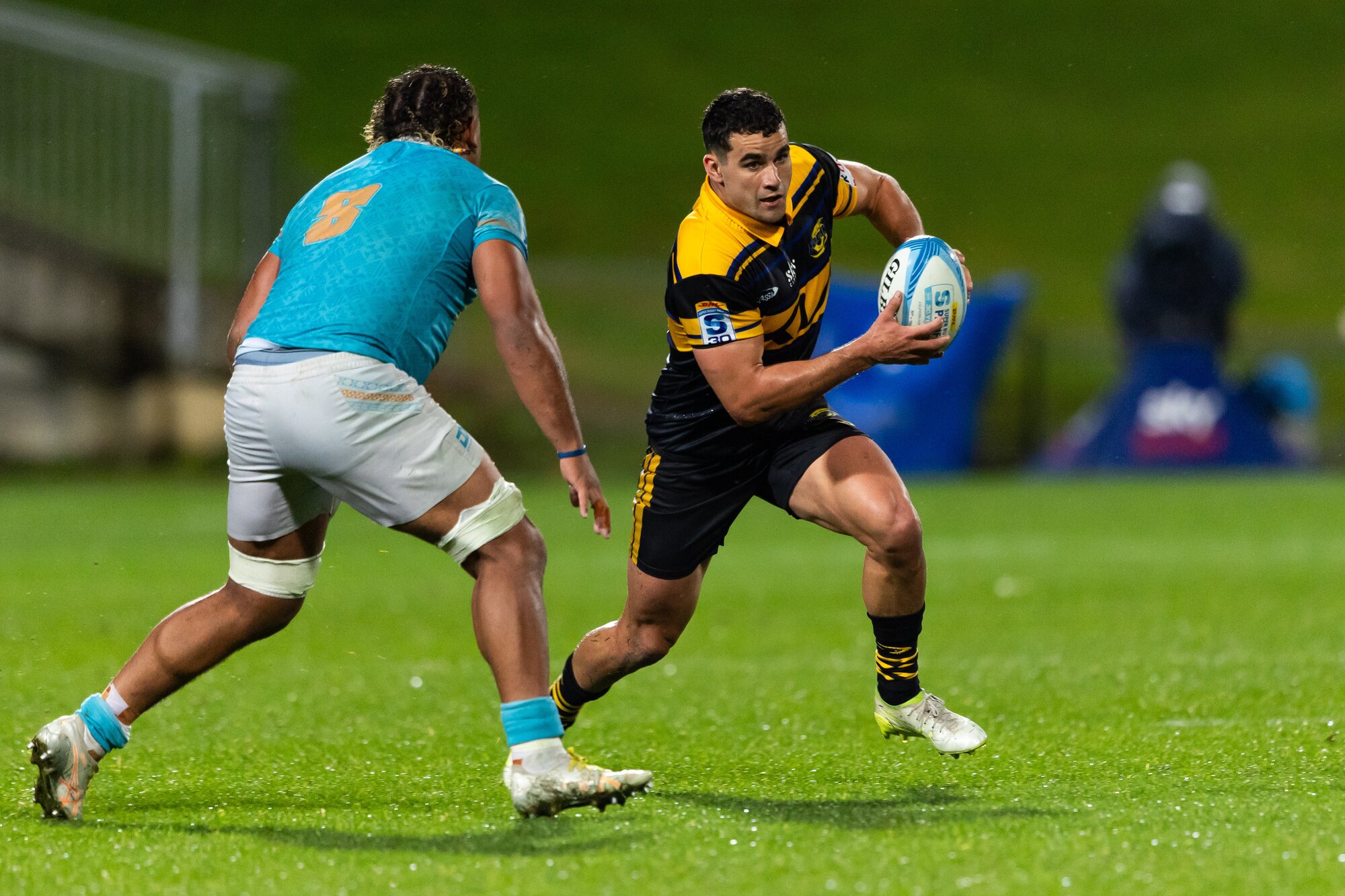 Hurricanes winger Josh Moorby on his way to one of his four tries against Moana Pasifika. Photo / Photosport