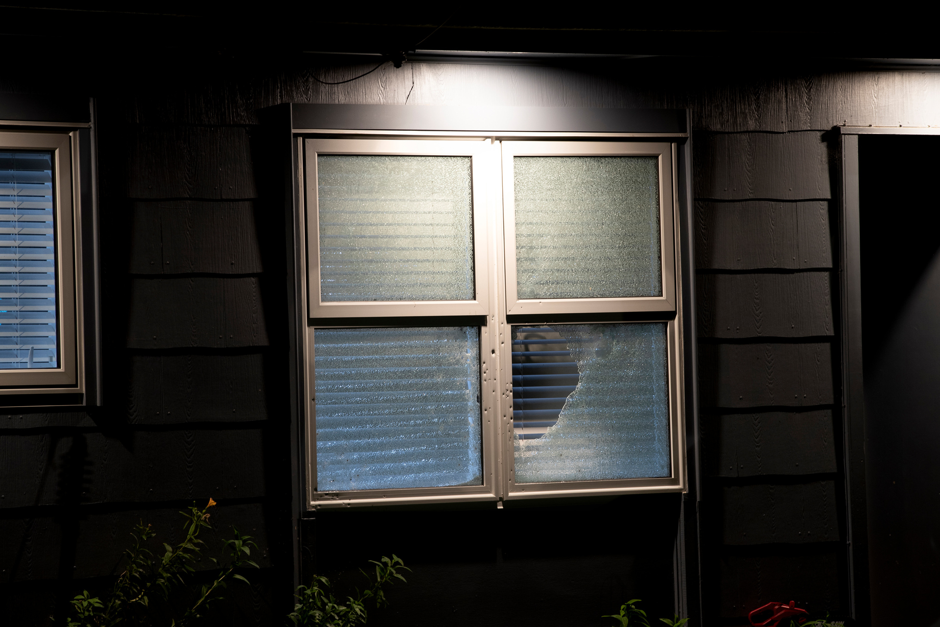 A shot out window at a home in Caspar Rd, Papatoetoe on Tuesday. Photo / Hayden Woodward