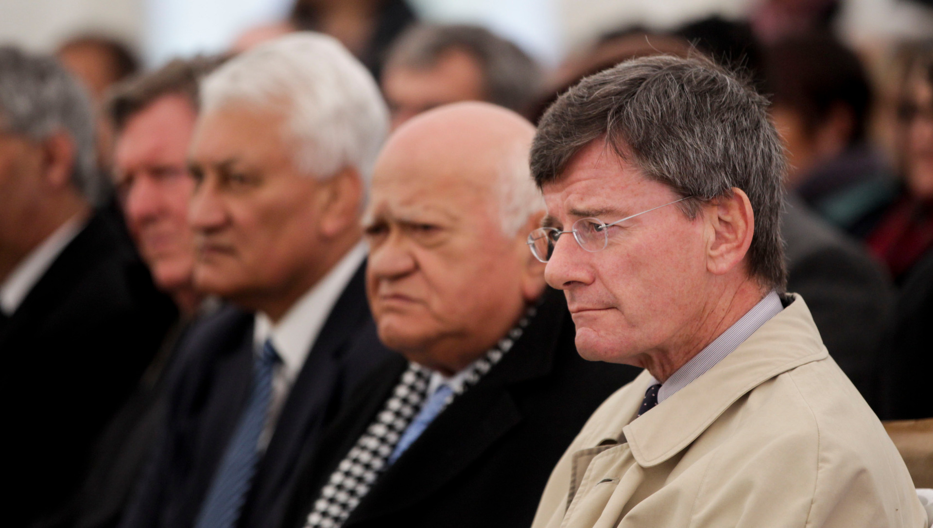 Chris Finlayson, right, with adviser John Clarke next to him, colleague Nuk Korako, and negotiator Rick Barker, left,  at the Heretaunga Tamatea deed of settlement signing, 2015. Photo / Paul Taylor