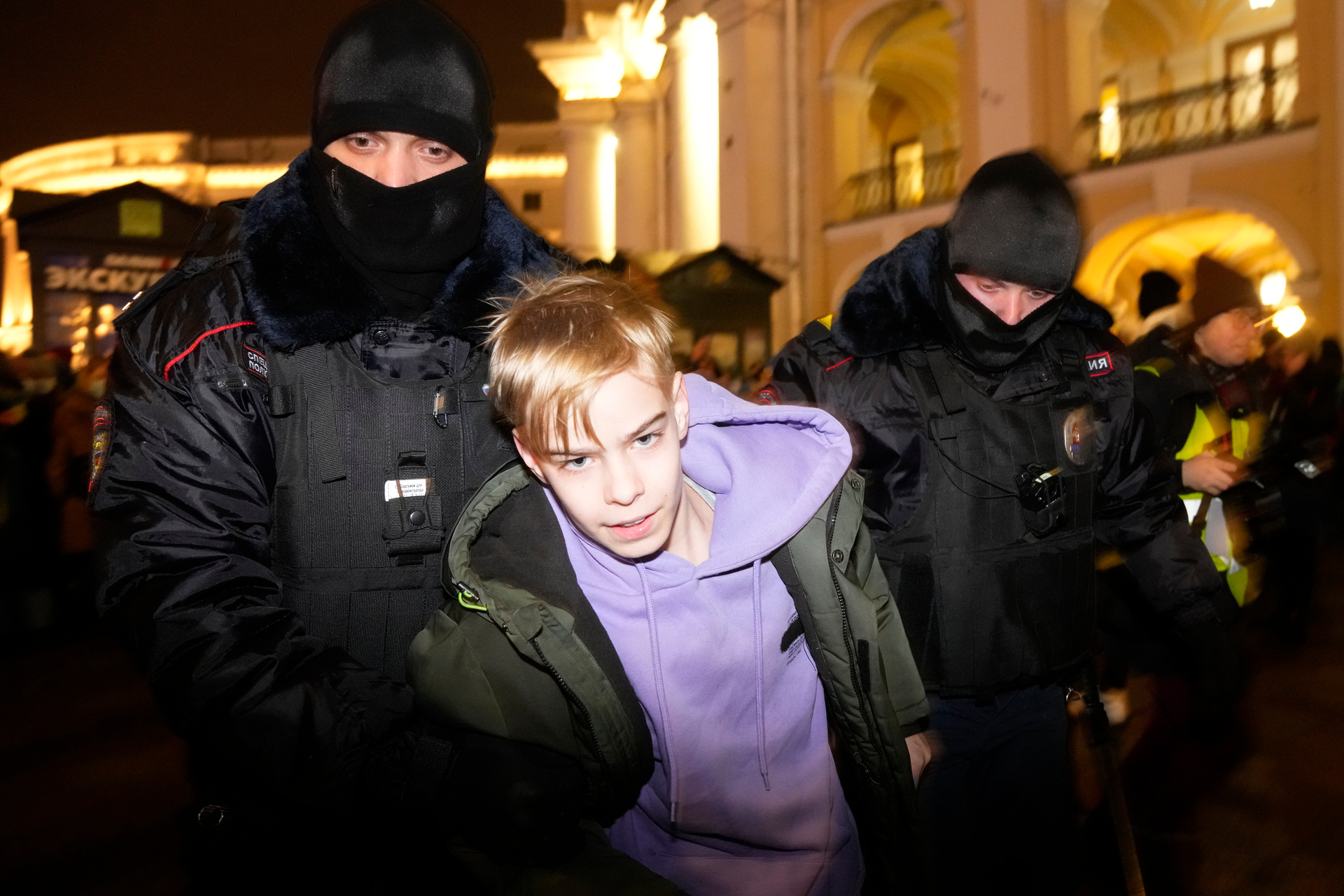 Police officers detain a young Russian demonstrator in St Petersburg. Photo / AP
