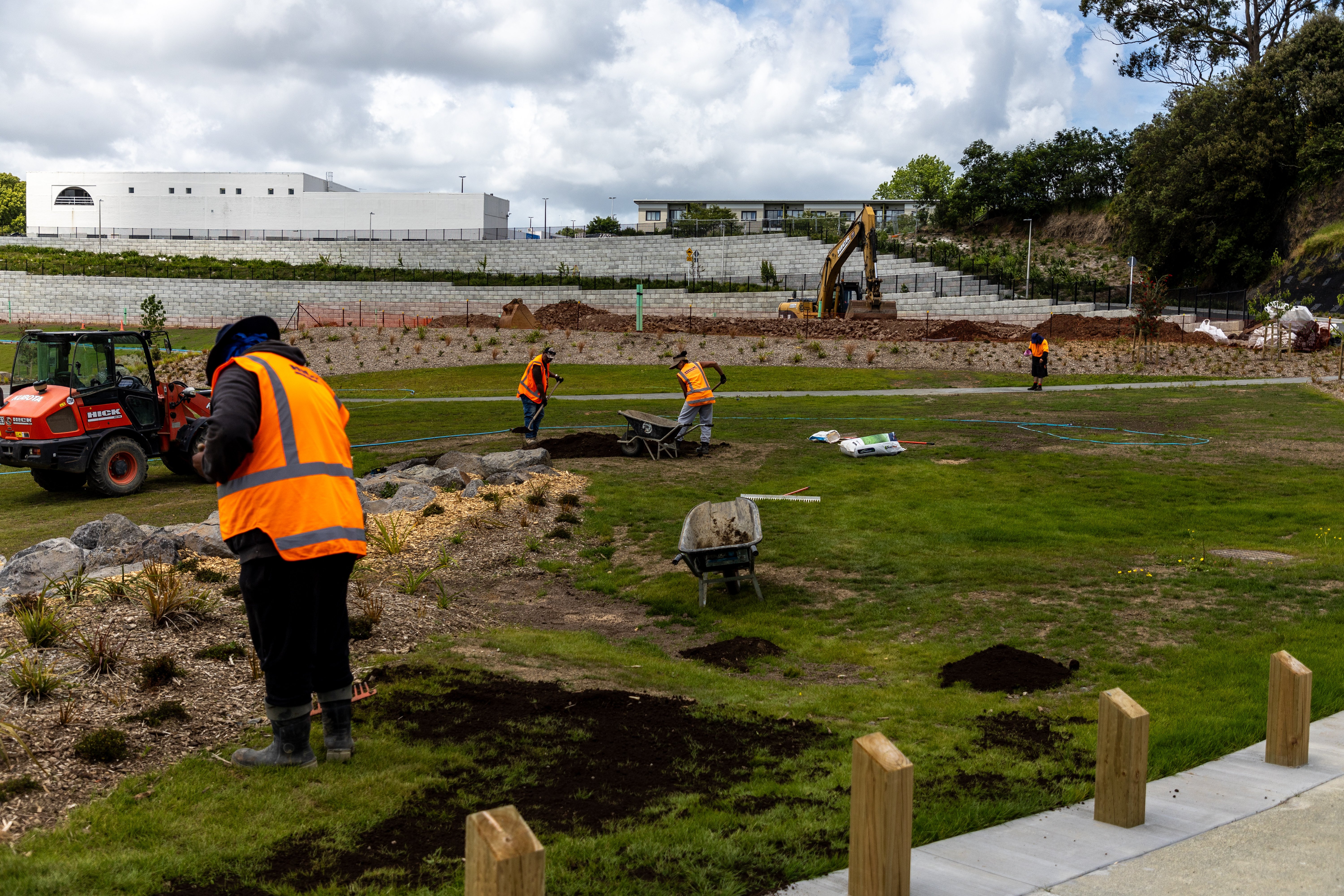 Gardeners at work at the ex-Three Kings Quarry which Fletcher Living is developing into a housing estate. Photo / Michael Craig
