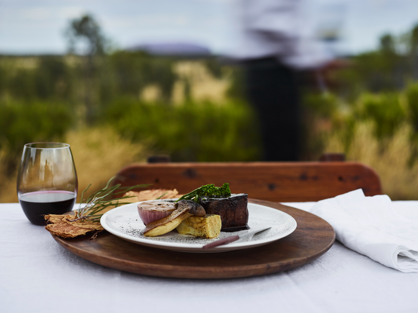 Tali Wiru Wagyu Beef Main with an Australian red. Tali Wiru in Australia offers a fine dining experience overlooking Uluru and Kata Tjuta. Photo / Voyages Ayers Rock Resort