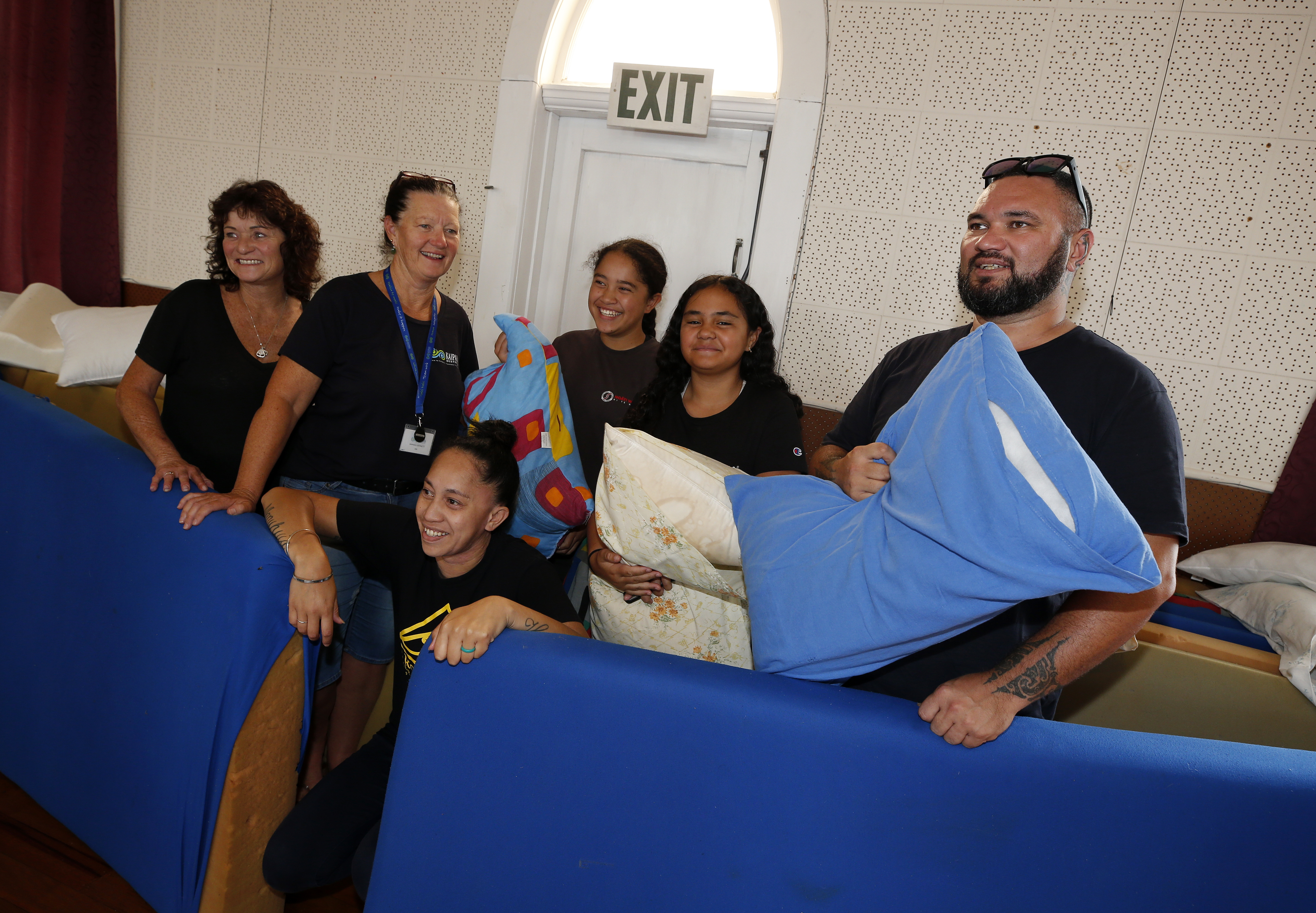 Annette Frost, Amanda Bennett, Moana Te Tuhi, Tiaho Te Tuhi, Puawai Hokai and Francis Toko have all volunteered at the Civil Defence emergency evacuation centre at the Holy Trinity Church in Dargaville. Photo / Michael Cunningham