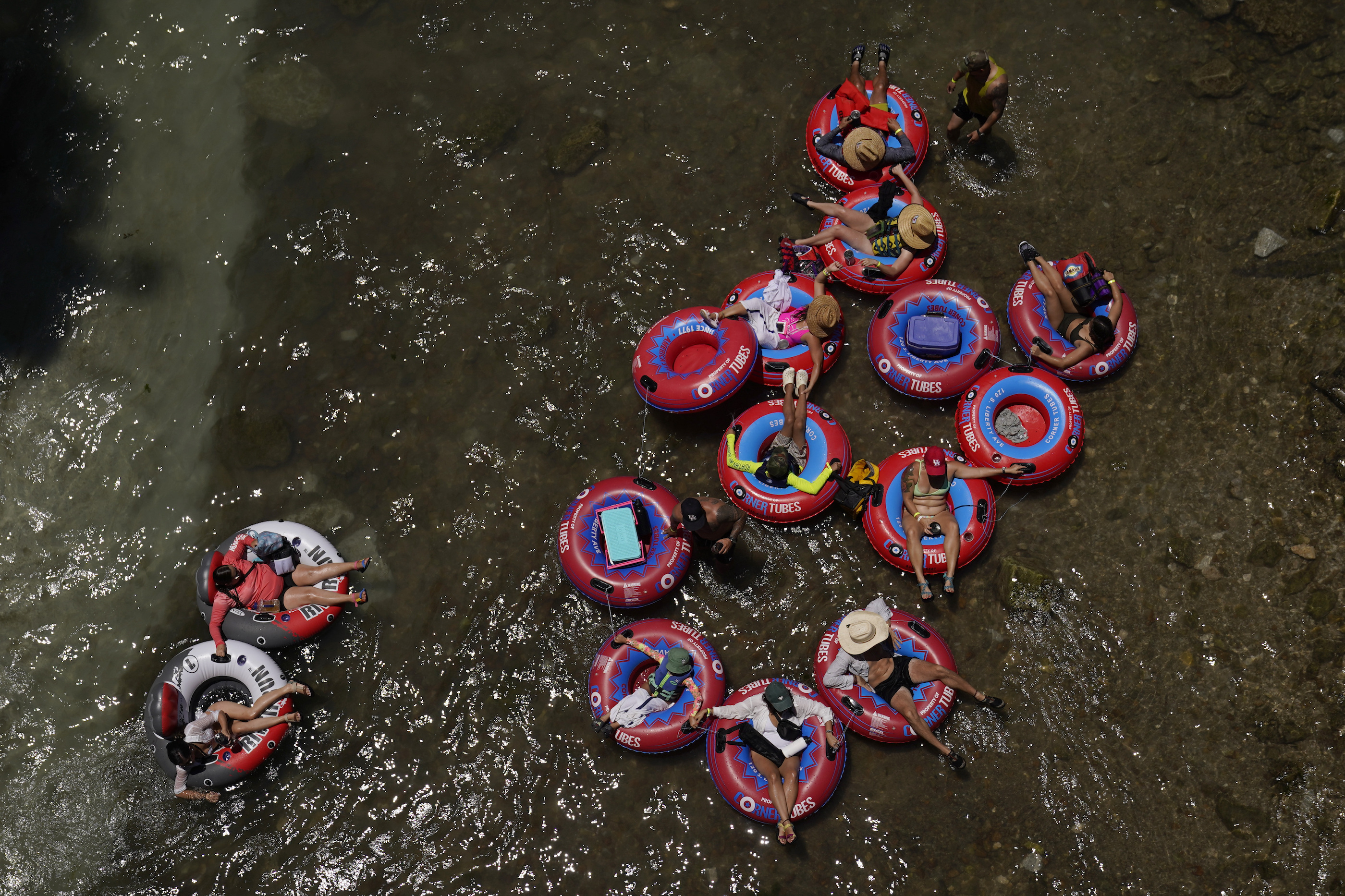 Tubers float the cool Comal River in New Braunfels, Texas. Photo / AP 