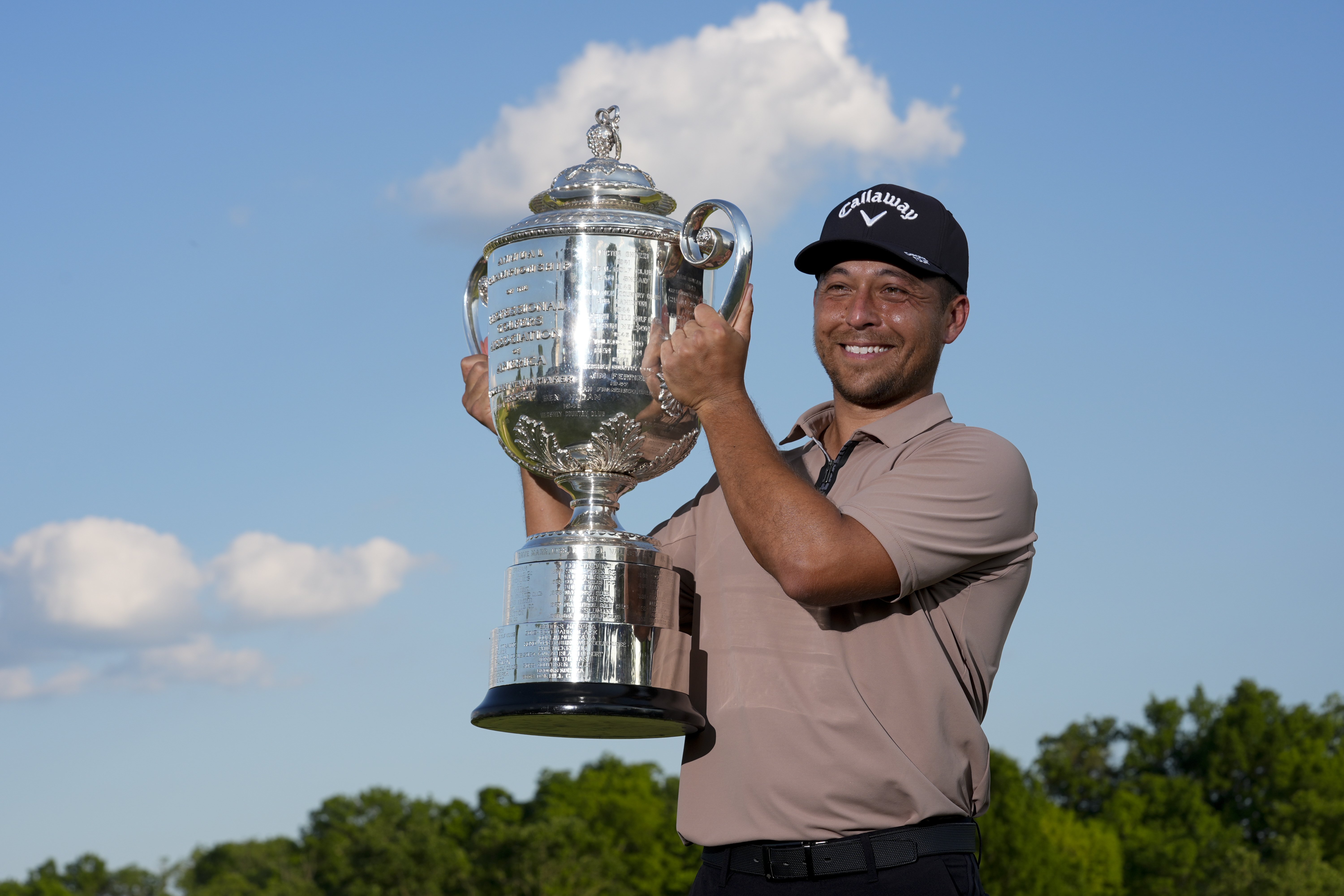 Xander Schauffele holds the Wanamaker trophy after winning the PGA Championship golf tournament at the Valhalla Golf Club. Photo / AP