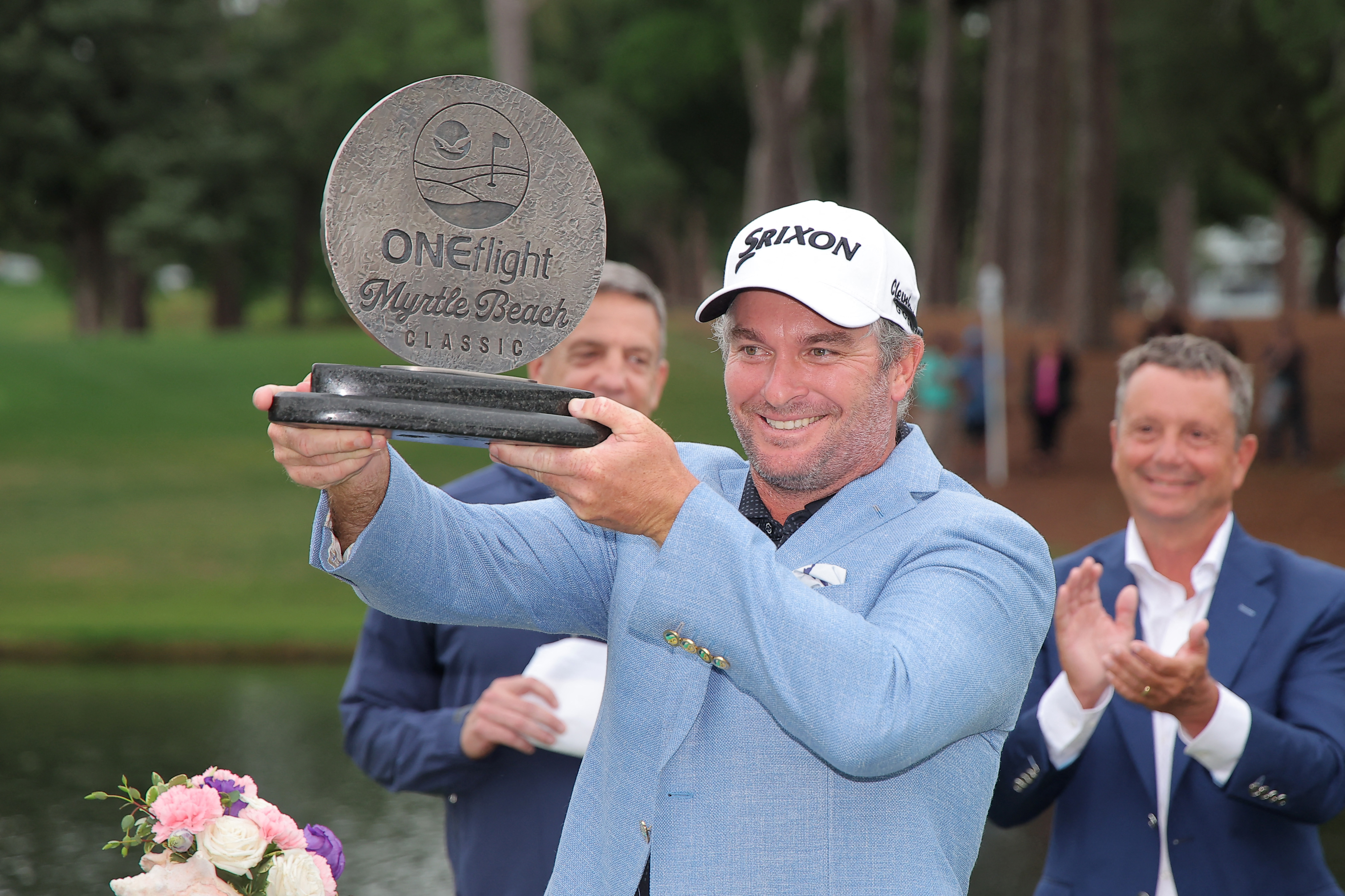 Ryan Fox of New Zealand celebrates with the trophy after winning the Myrtle Beach Classic in a playoff. Photo / AFP