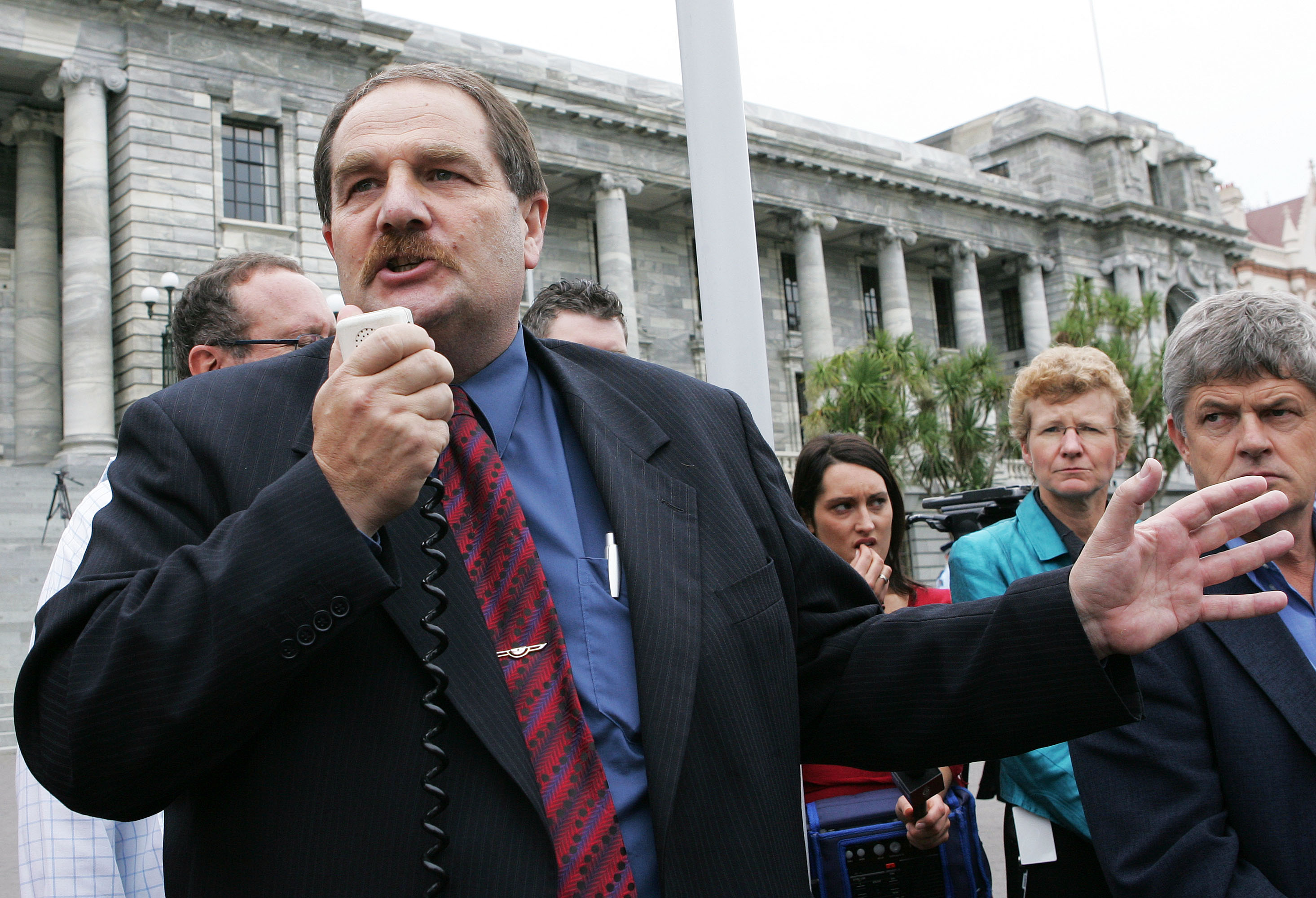 National MP Chester Borrows makes a speech on the steps of Parliament after a protest against the Anti Smacking Bill passing through Parliament in 2007. Photo / NZPA