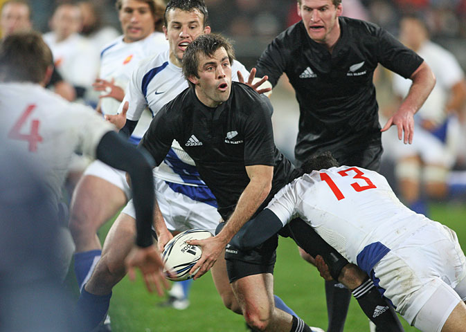 All Blacks centre Conrad Smith looks to offload against France in Wellington. Photo / Mark Mitchell