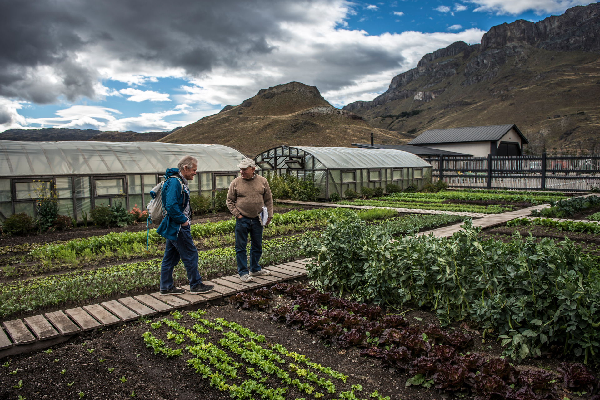 Chouinard, right, with Rick Ridgeway at organic gardens that supply a restaurant in Patagonia National Park, Chile, on January 29, 2018. Photo / Meridith Kohut, The New York Times
