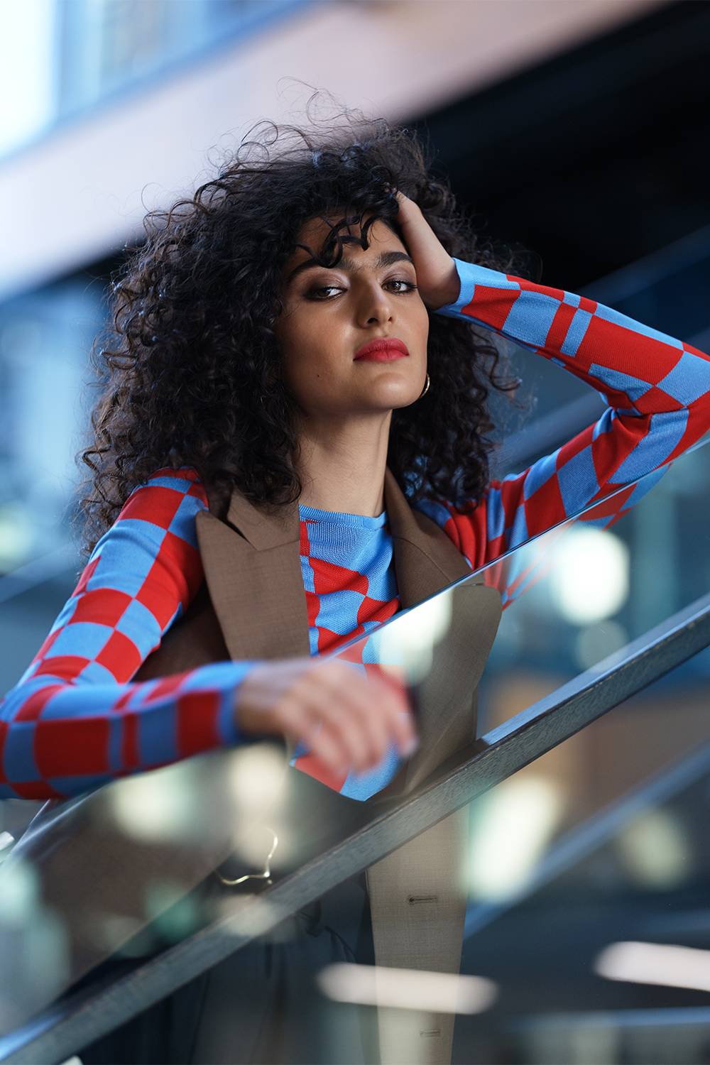 Paloma Wool top, $279, from Blackbox Boutique. Wynn Hamlyn vest POA. Model / Roxie Mohebbi from N Model Management. Photo / Lula Cucchiara.