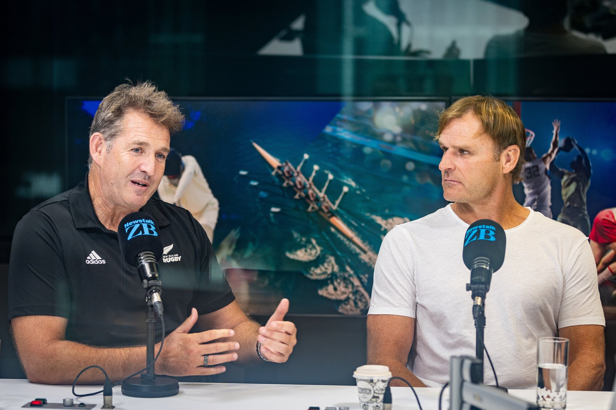 Former NZ Rugby CEO Mark Robinson with former All Blacks coach Scott Robertson while recording the Rugby Direct podcast. Photo / Michael Craig

