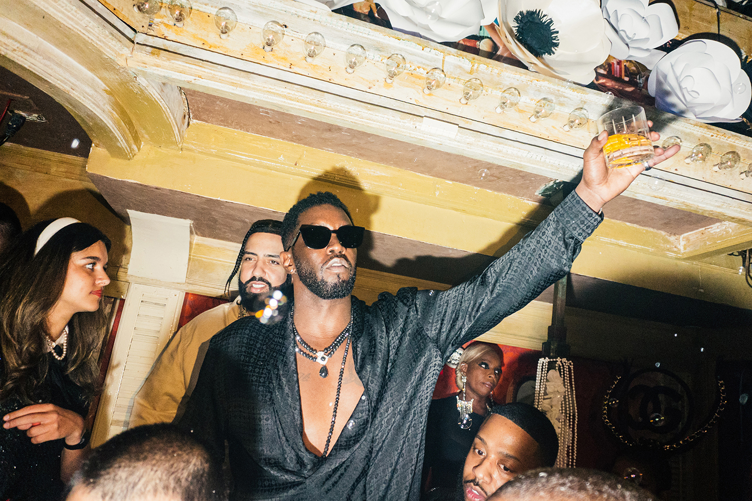 Sean Combs, known as Diddy, makes a toast during his Met Gala afterparty in New York in 2023. Photo / Jutharat Pinyodoonyachet, The New York Times