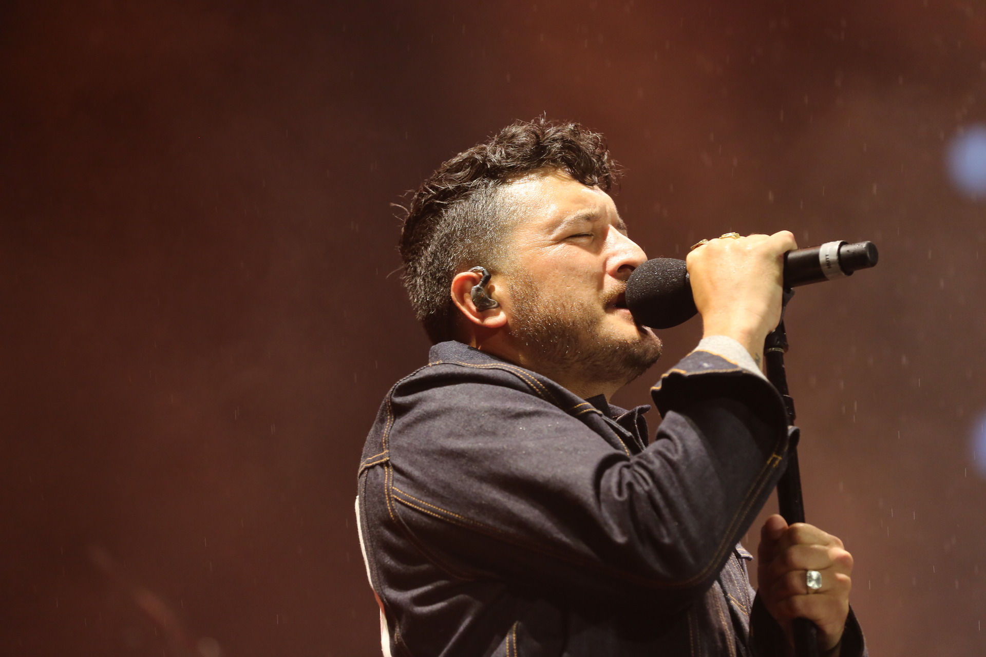 Six60 lead singer Matiu Walters and his band-mates were on song as they made history at Eden Park last night. Photo / Sylvie Whinray