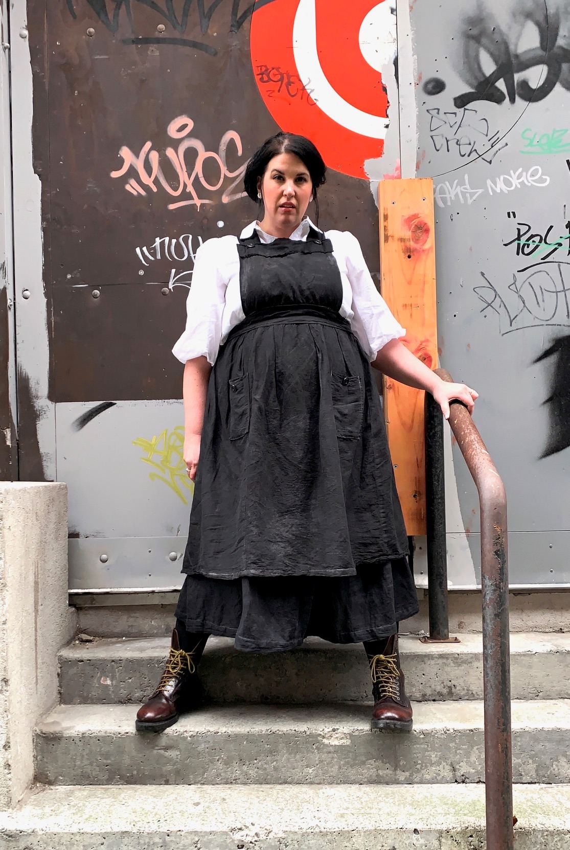 Post-lockdown, businesswoman and Instagram fashionista Louise Sutherland has switched peacock brights for textured blacks. Photo / @bonjela_lawson