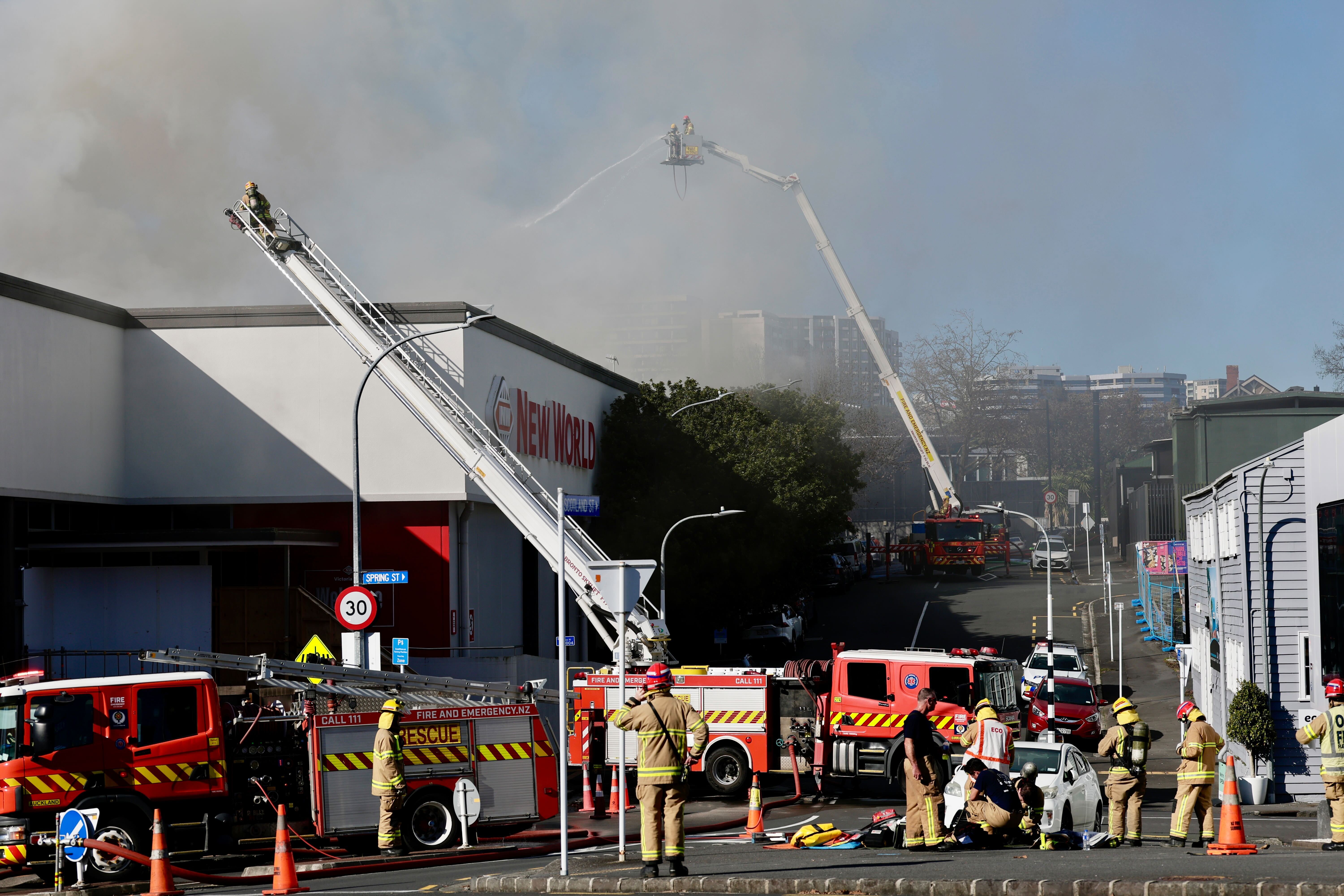 Firefighters tackling the fire from the air. Photo / Dean Purcell