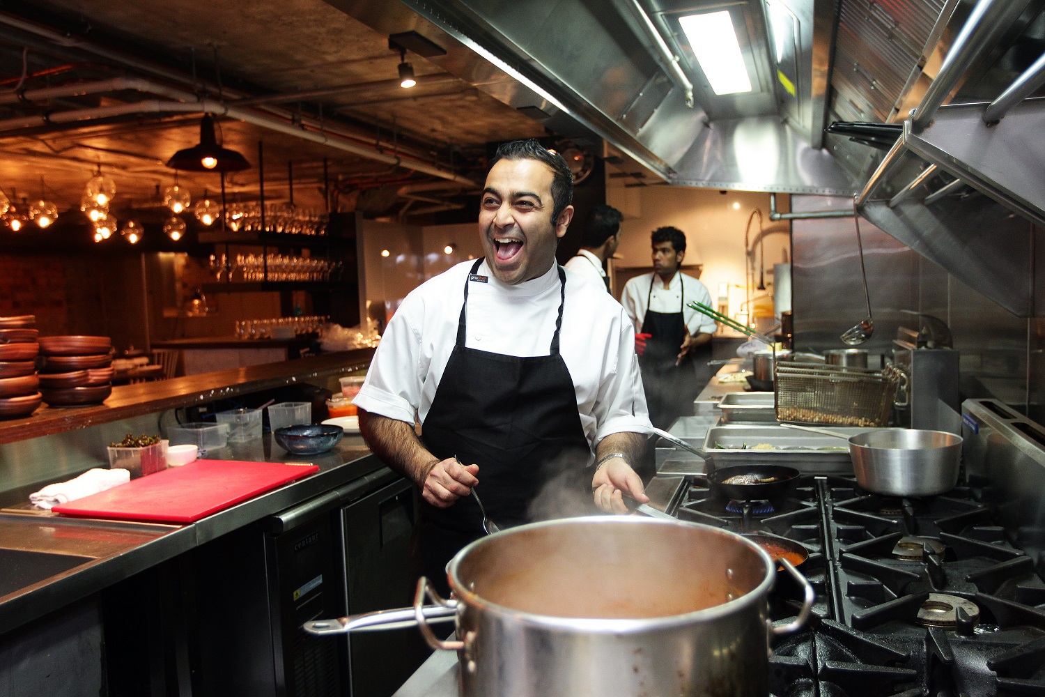 Sid Sahrawat in the kitchen at Cassia. Photo / Doug Sherring