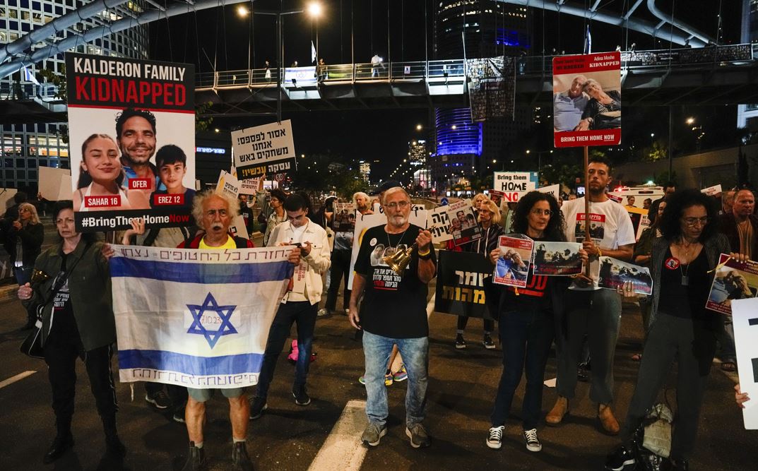 Families and friends of about 240 hostages held by Hamas in Gaza call for Israeli Prime Minister Benjamin Netanyahu to bring them home during a demonstration in Tel Aviv. Photo / AP