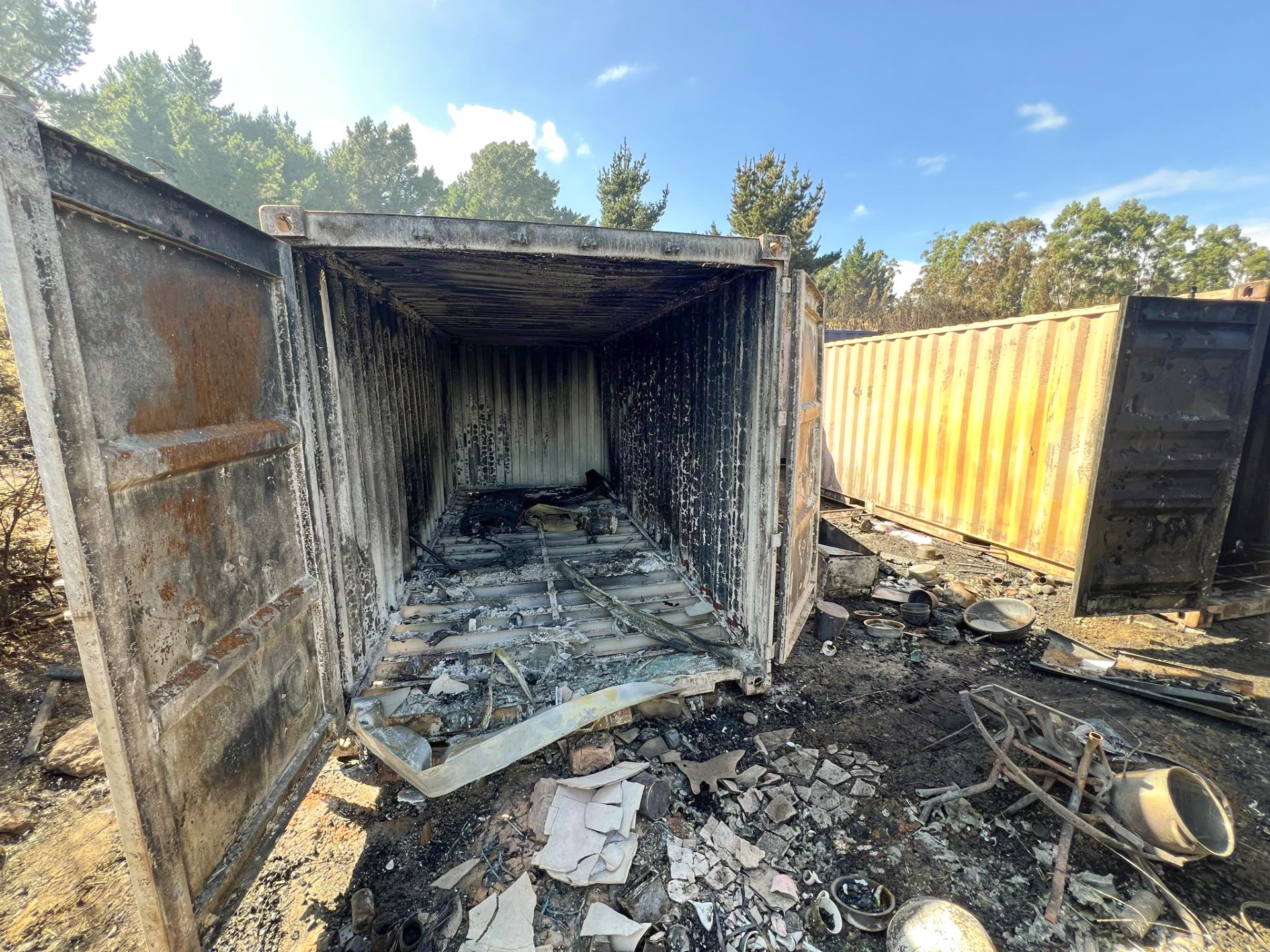 Anna's container was reduced to charred embers and much of the family's land was scorched. Photo / Woman's Day