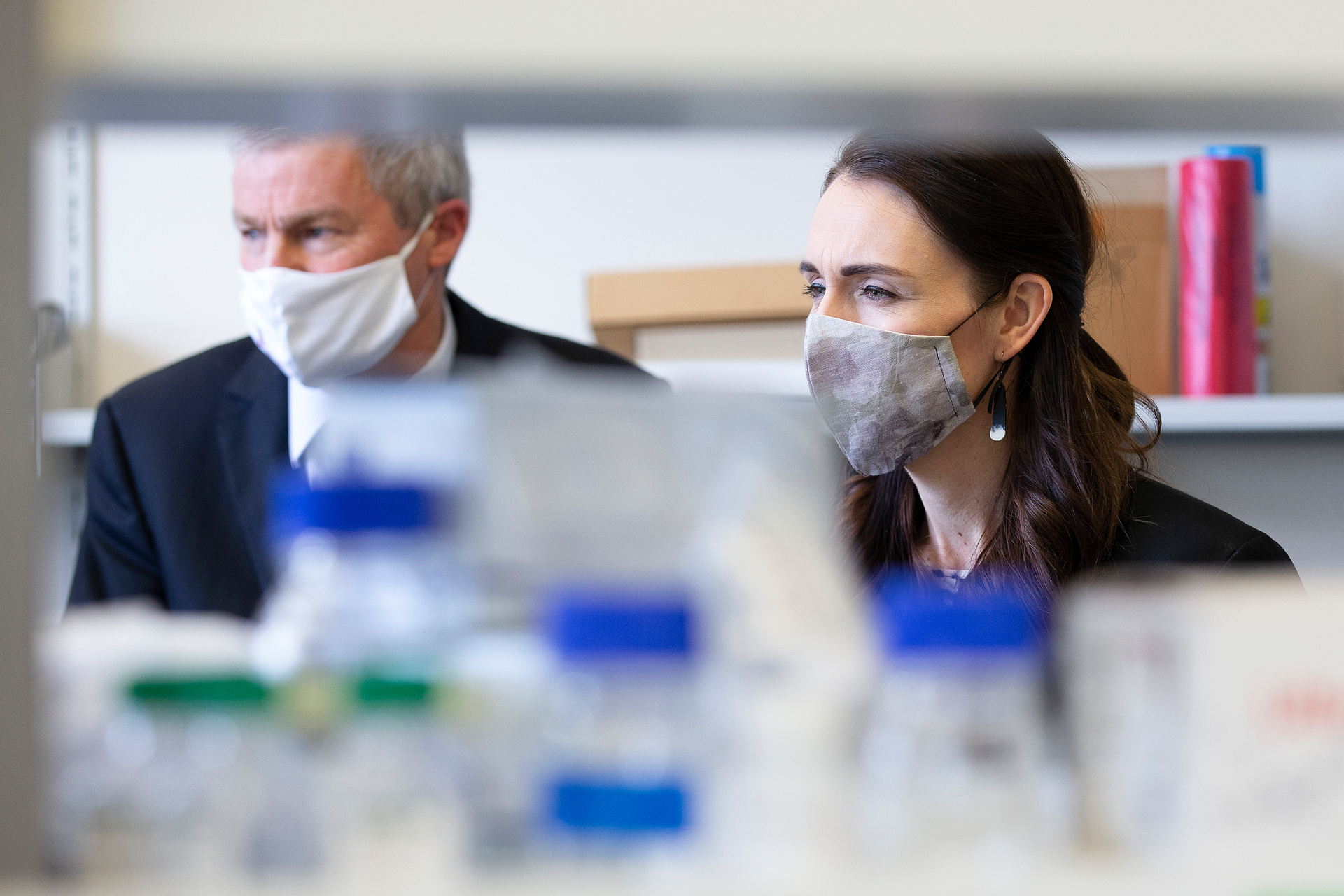 Prime Minister Jacinda Ardern tours Wellington's Malaghan Institute of Medical Research with director Professor Graham Le Gros. A Kiwi-made booster could be trialled by late 2022. Photo / Getty Images