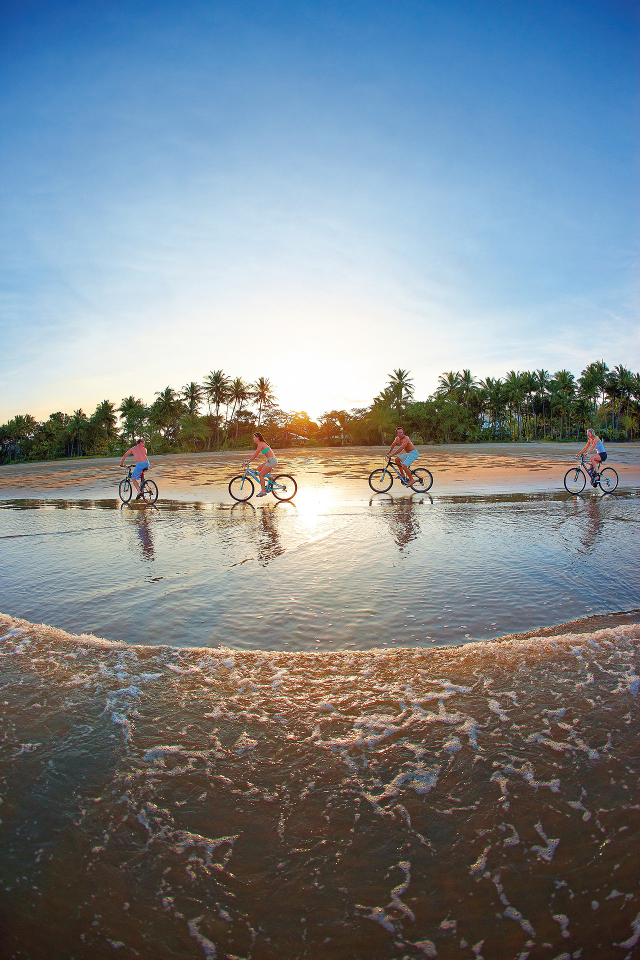 Cycling on Mission Beach, Tropical North Queensland. Photo / Tourism and Events Queensland