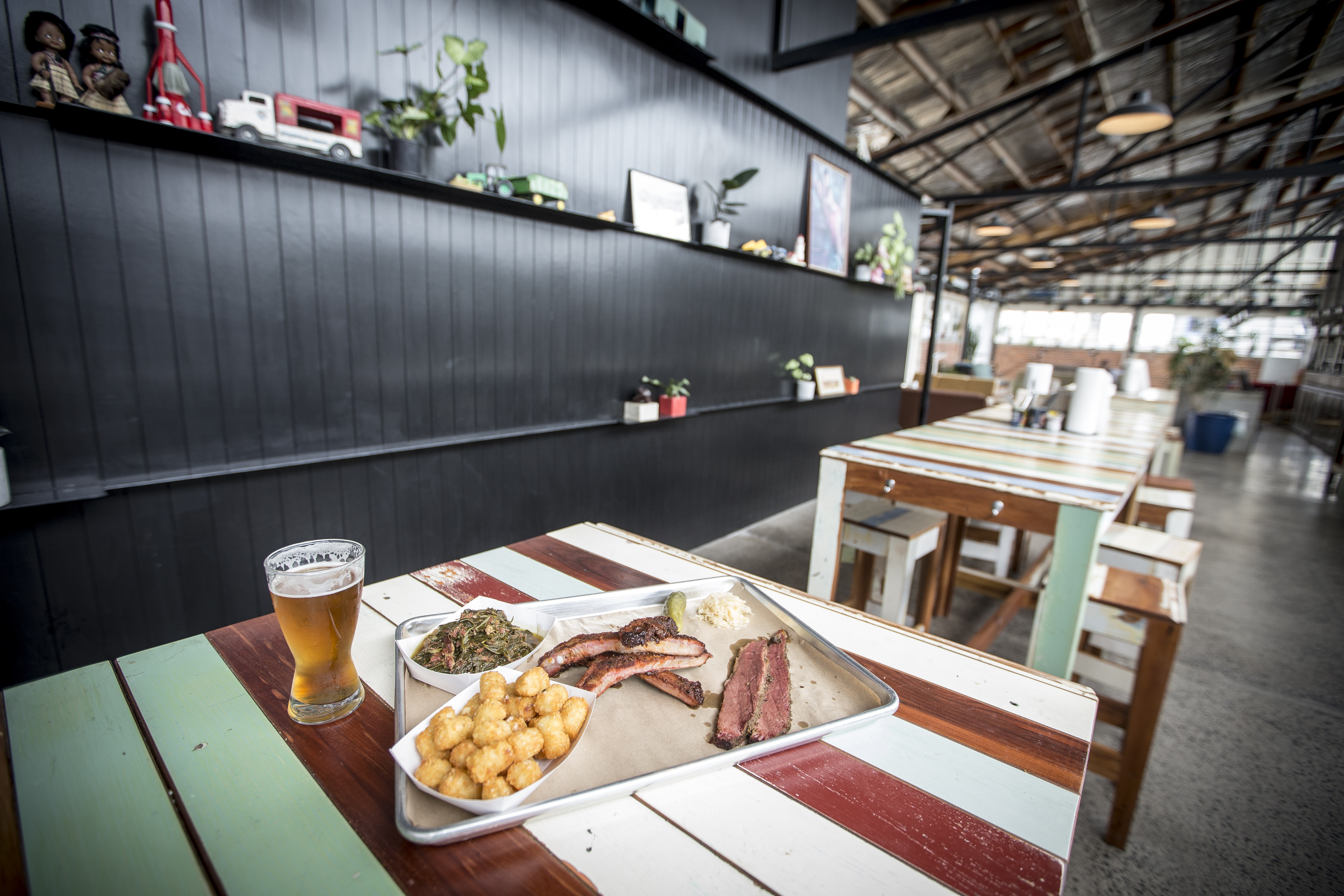 Pork ribs, pastrami, collard greens and tater tots at Juke Joint, Brothers Brewery, Mt Eden. Photo / Michael Craig
