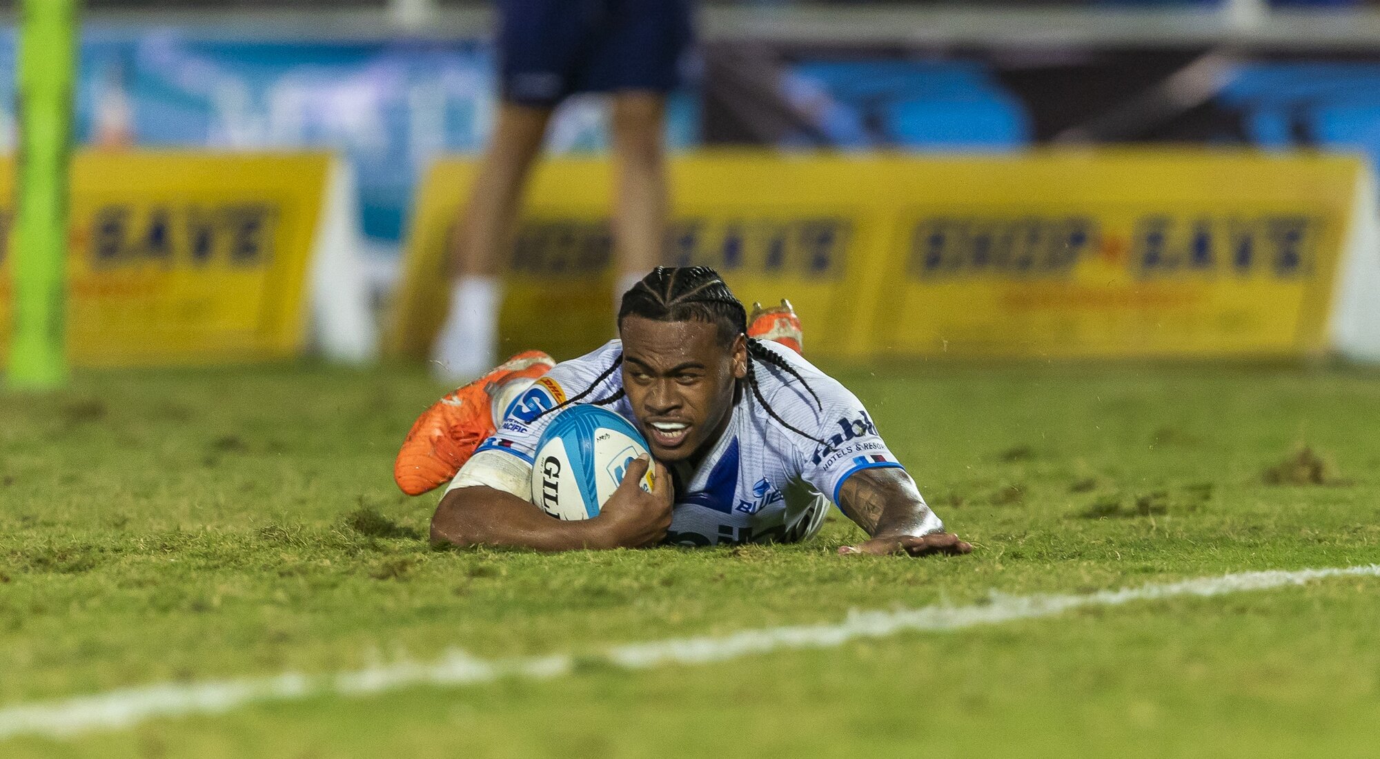 Blues midfielder Taufa Funaki scores in Suva. Photo / SmartFrame