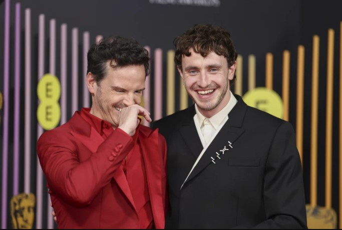 Andrew Scott, left, and Paul Mescal pose for photographers upon arrival at the BAFTAs. (Photo by Vianney Le Caer/Invision/AP)