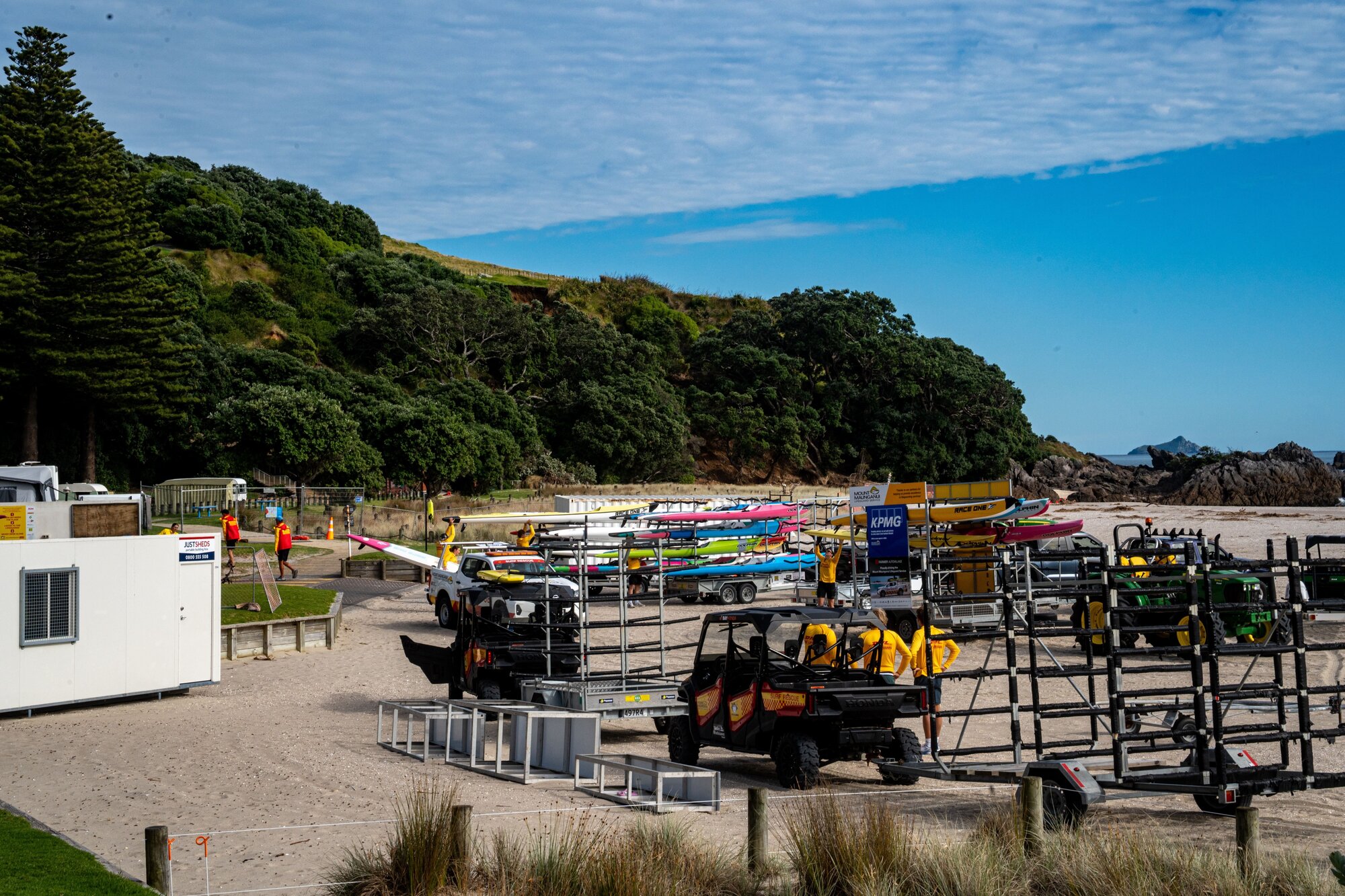 Mount Maunganui Surf Life Saving Club members clearing equipment after the building was red-placarded in January. Photo / Corey Fleming