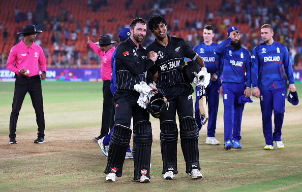 AHMEDABAD, INDIA - OCTOBER 05: Devon Conway and Rachin Ravindra of New Zealand make their way off after an unbeaten 273 partnership following the ICC Men's Cricket World Cup India 2023 between England and New Zealand at Narendra Modi Stadium on October 05, 2023 in Ahmedabad, India. (Photo by Matthew Lewis-ICC/ICC via Getty Images)