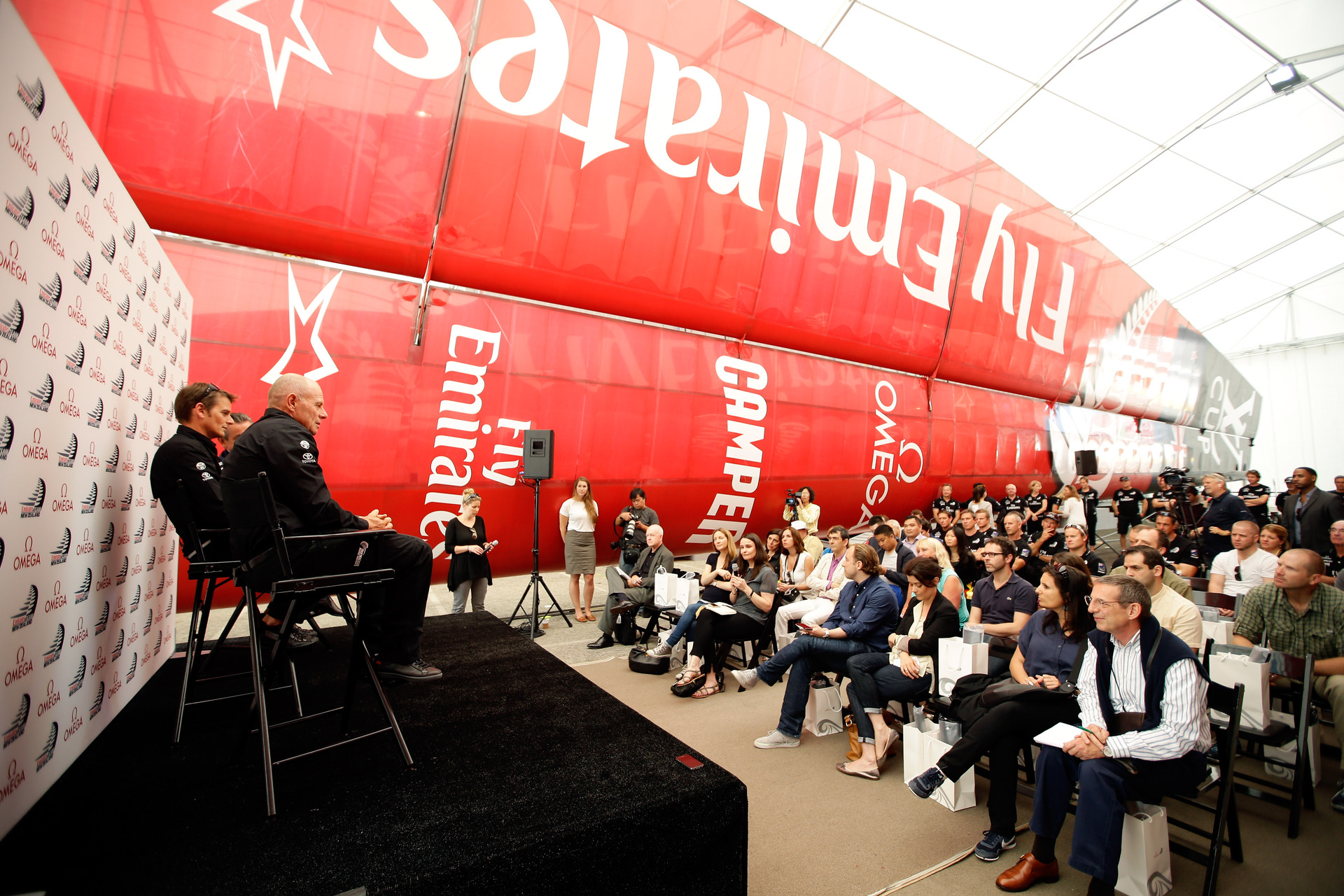 Media gather at the Emirates Team New Zealand Base Camp for a press conference with ETNZ Skipper Dean Barker and Managing Director Grant Dalton. Photo / Getty Images.