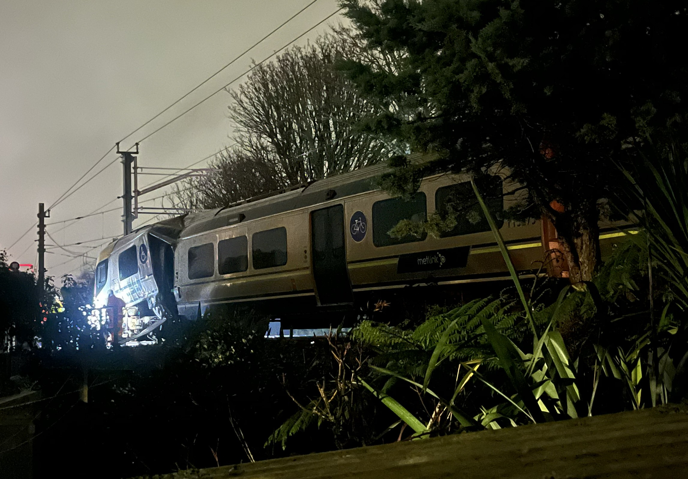 Multiple people have been injured after a train derailment on Wellington’s Johnsonville line near Cashmere Ave in Khandallah this evening. Photo / Gary Hutchings
