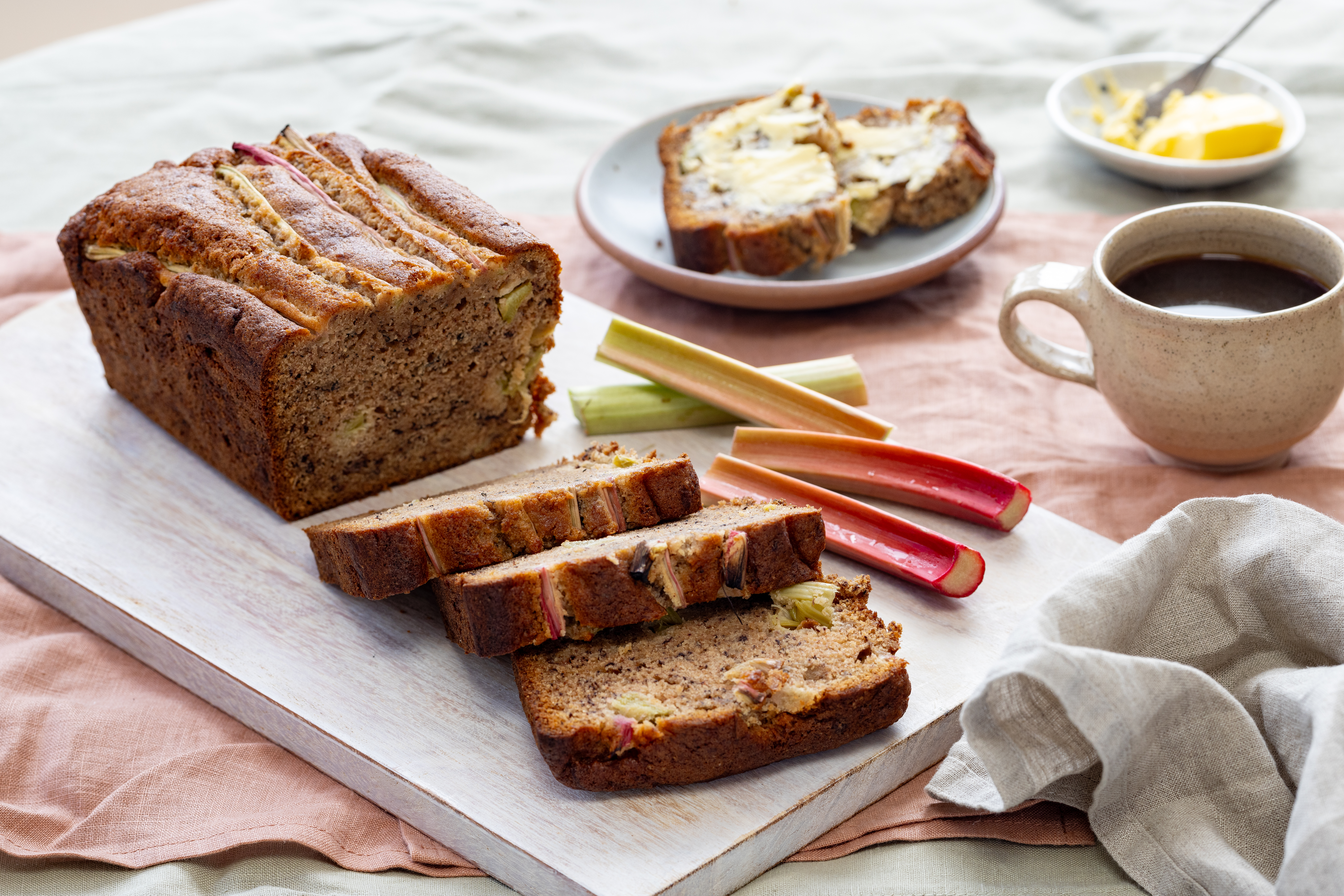 Whip up a delicious loaf with mashed bananas, brown sugar and a topping of rhubarb. Photo / Babiche Martens