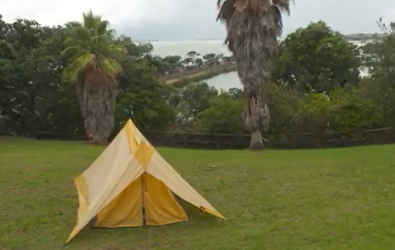 Protesters have set up tents and signage to show their opposition to a proposed Erebus crash memorial at Sir Dove-Myer Robinson Park. Photo / RNZ