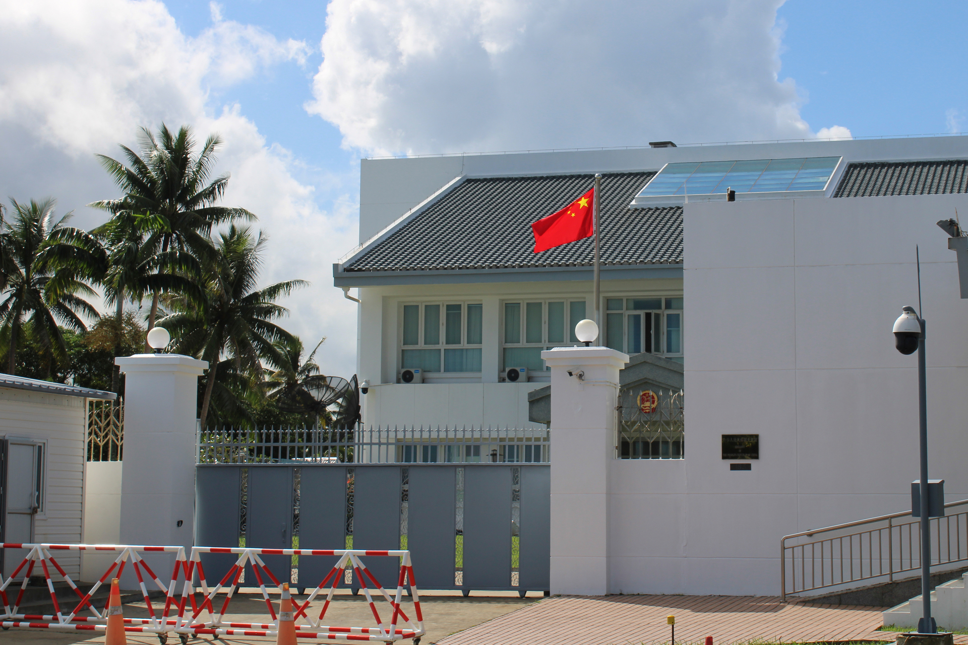 A barricade blocks the front of the Chinese Embassy in Suva, Fiji. Photo / AP