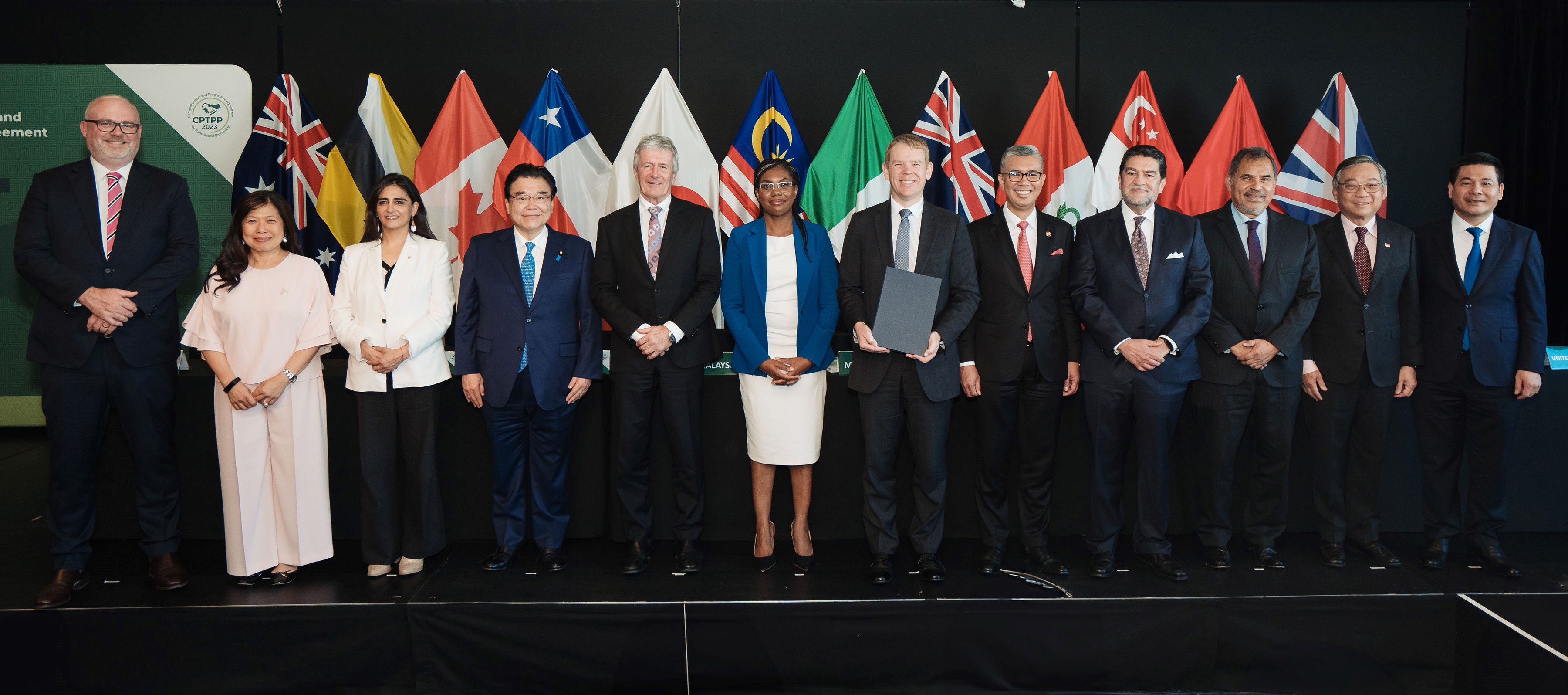 Prime Minister Chris Hipkins with UK trade chief Kemi Badenoch, centre, Trade Minister Damien O'Connor and other CPTPP ministers. Photo / Smoke Photography
