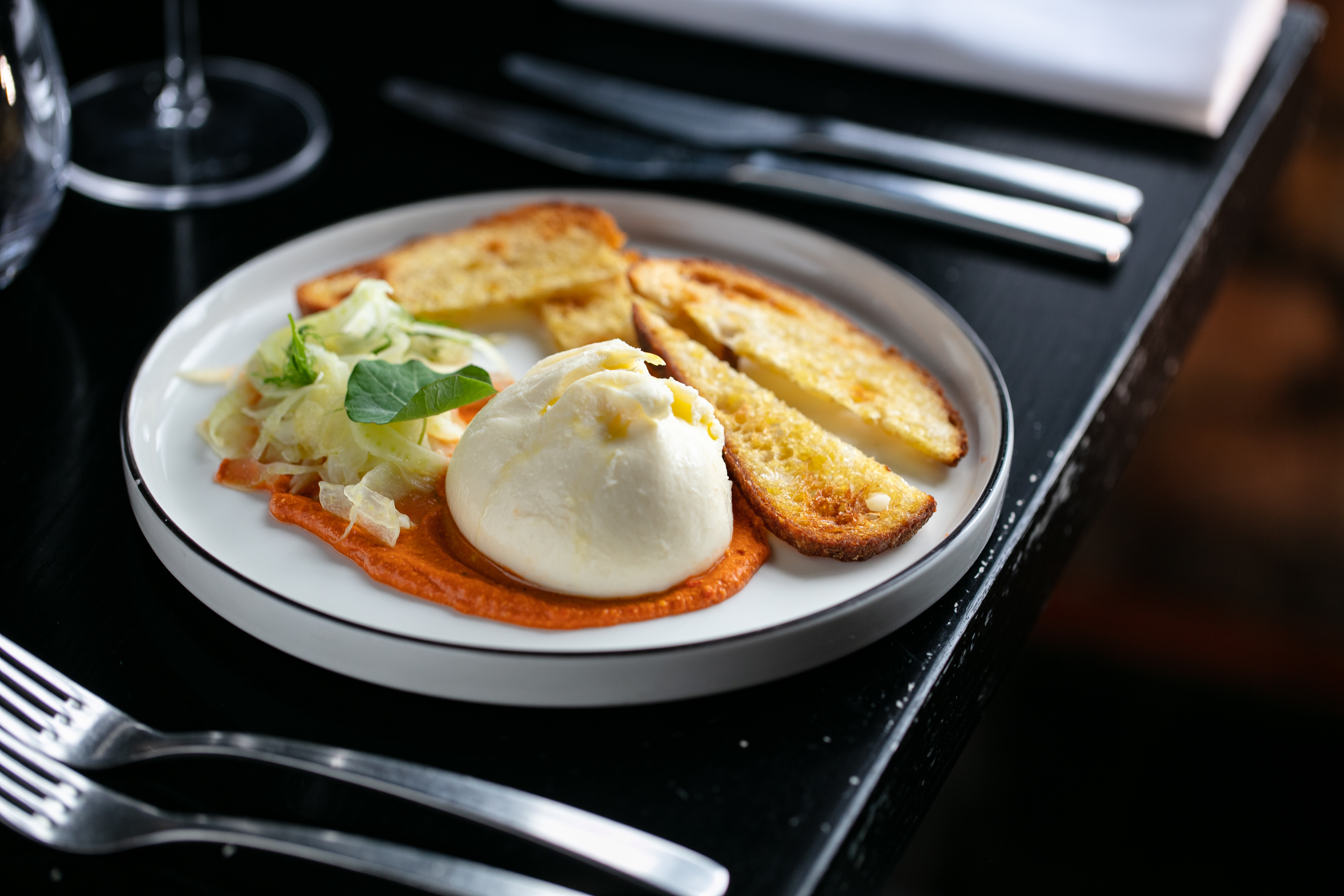 The burrata with fennel and roasted cashew romesco. Photo / Babiche Martens