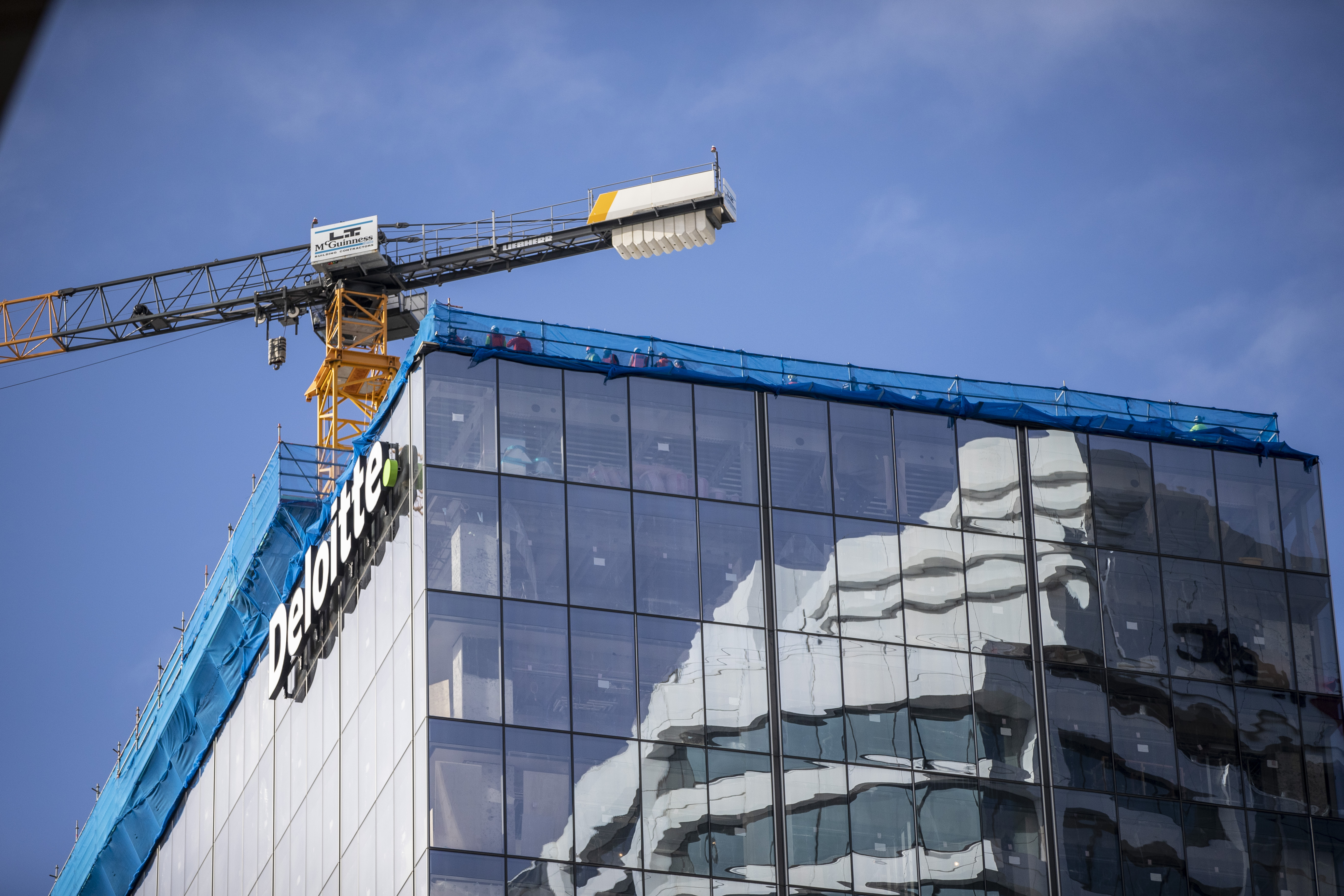 The 21-level tower at number one Queen St where Matu Reid worked. Photo / Michael Craig
