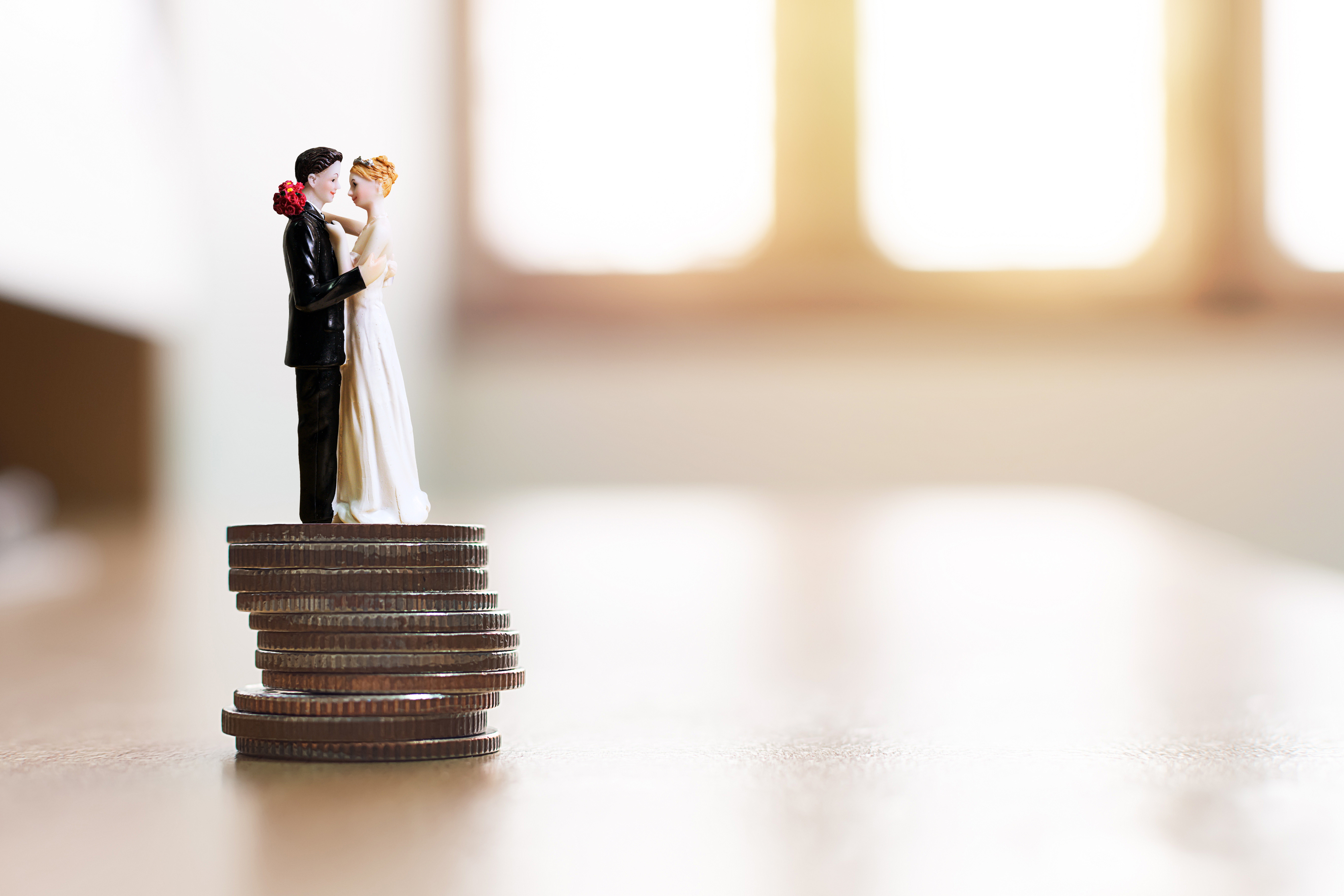 Two brides shared the costs of their big weddings. Photo / 123rf