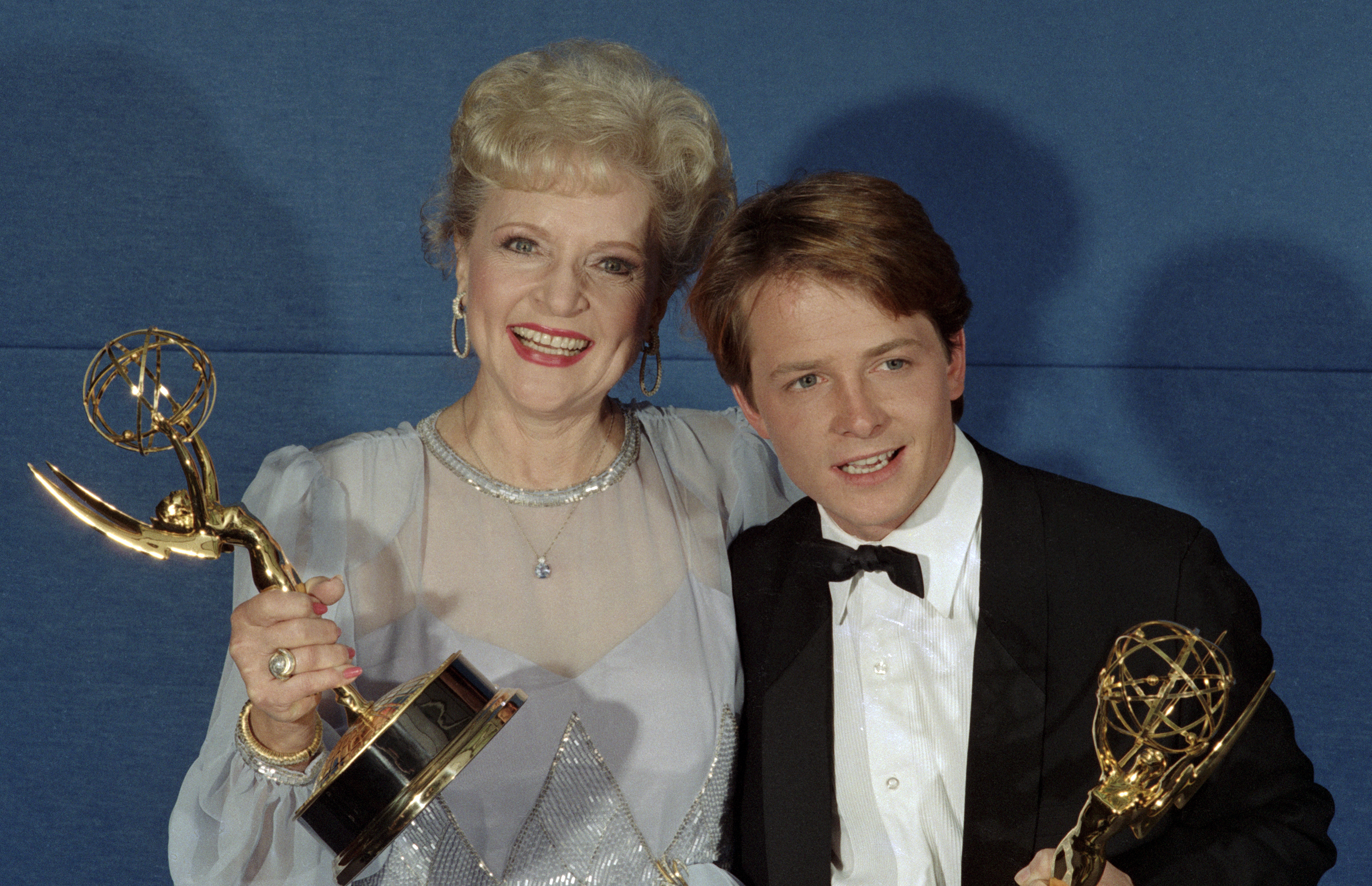 Emmy Winners Betty White and Michael J. Fox backstage at the Emmy Awards Show in 1986. Photo / Getty Images