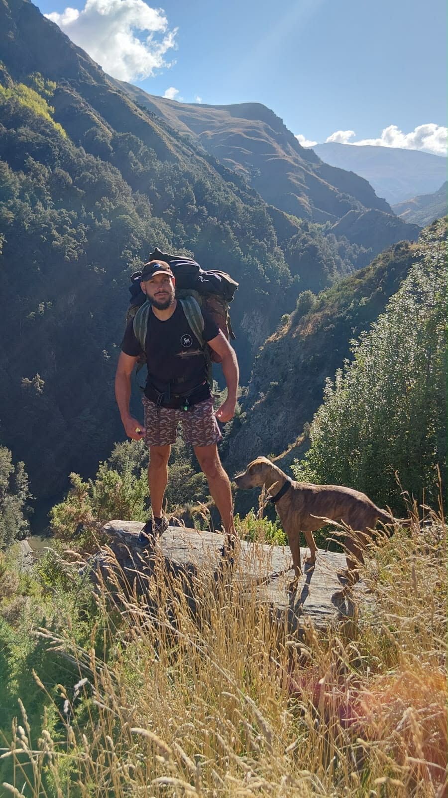 Shane Anderson on his way north out of Southland with dog Missy.