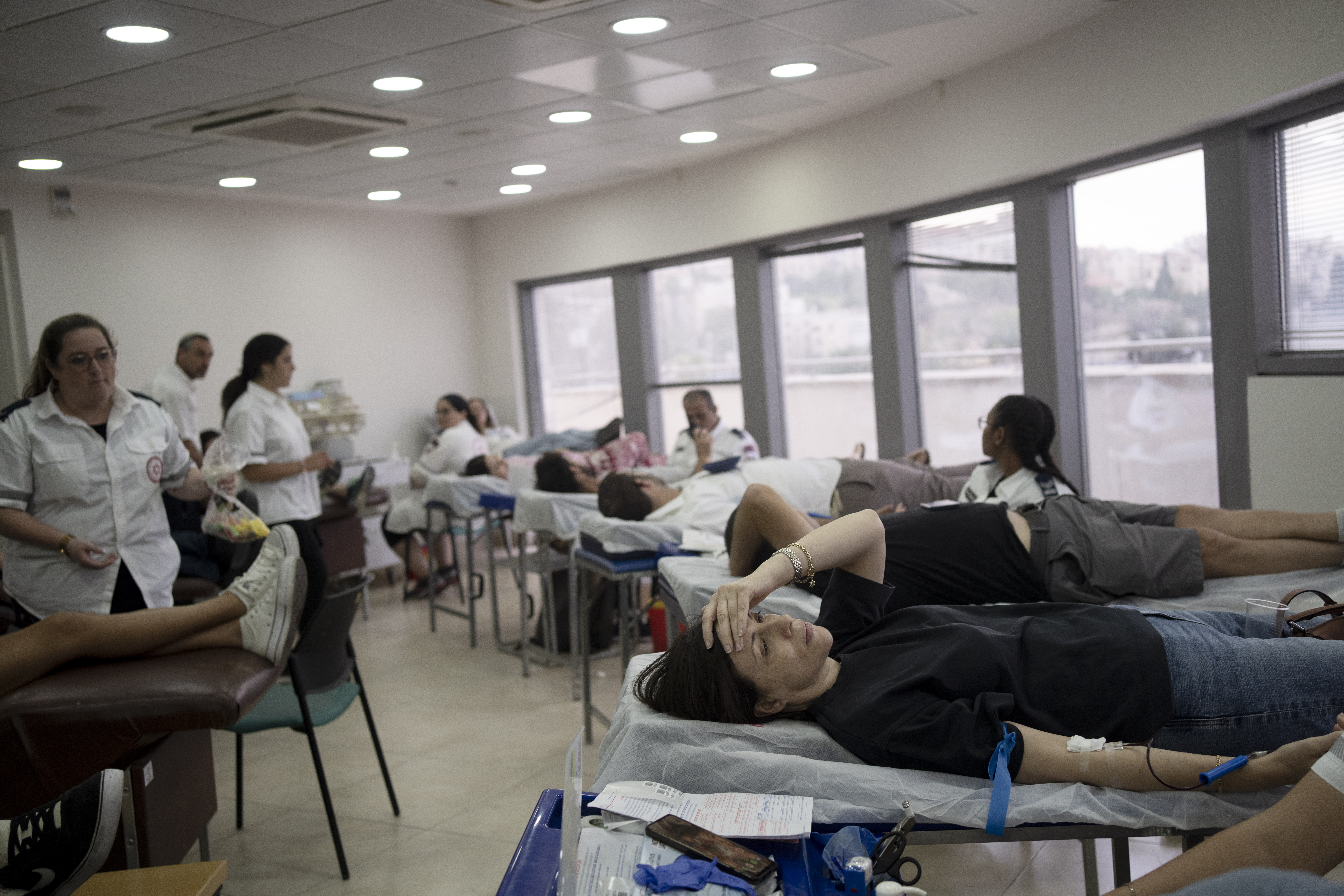 Israelis donate blood at Magen David Adom emergency service in Jerusalem, following an unprecedented attack by Hamas militants on Israel. Photo / AP